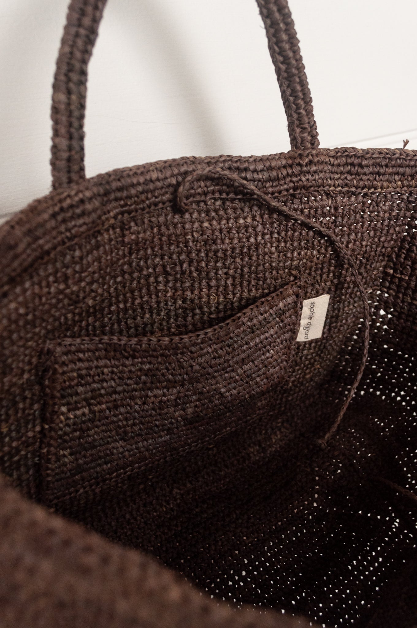 Sophie Digard medium sized crocheted raffia bag in Argile deep earthy brown.