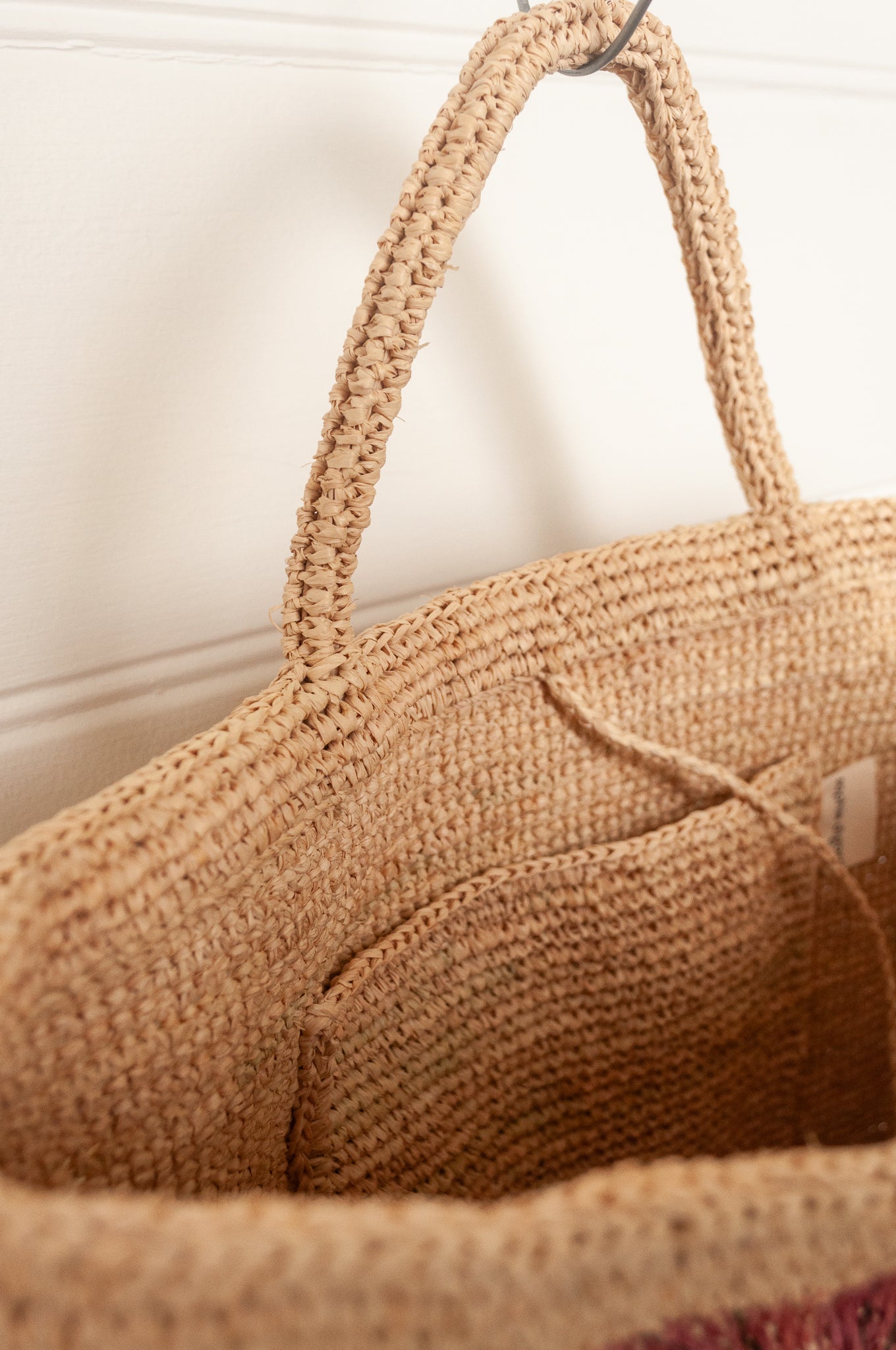 Sophie Digard natural coloured large tote bag with large flowers embroidered in warm neutral tones.