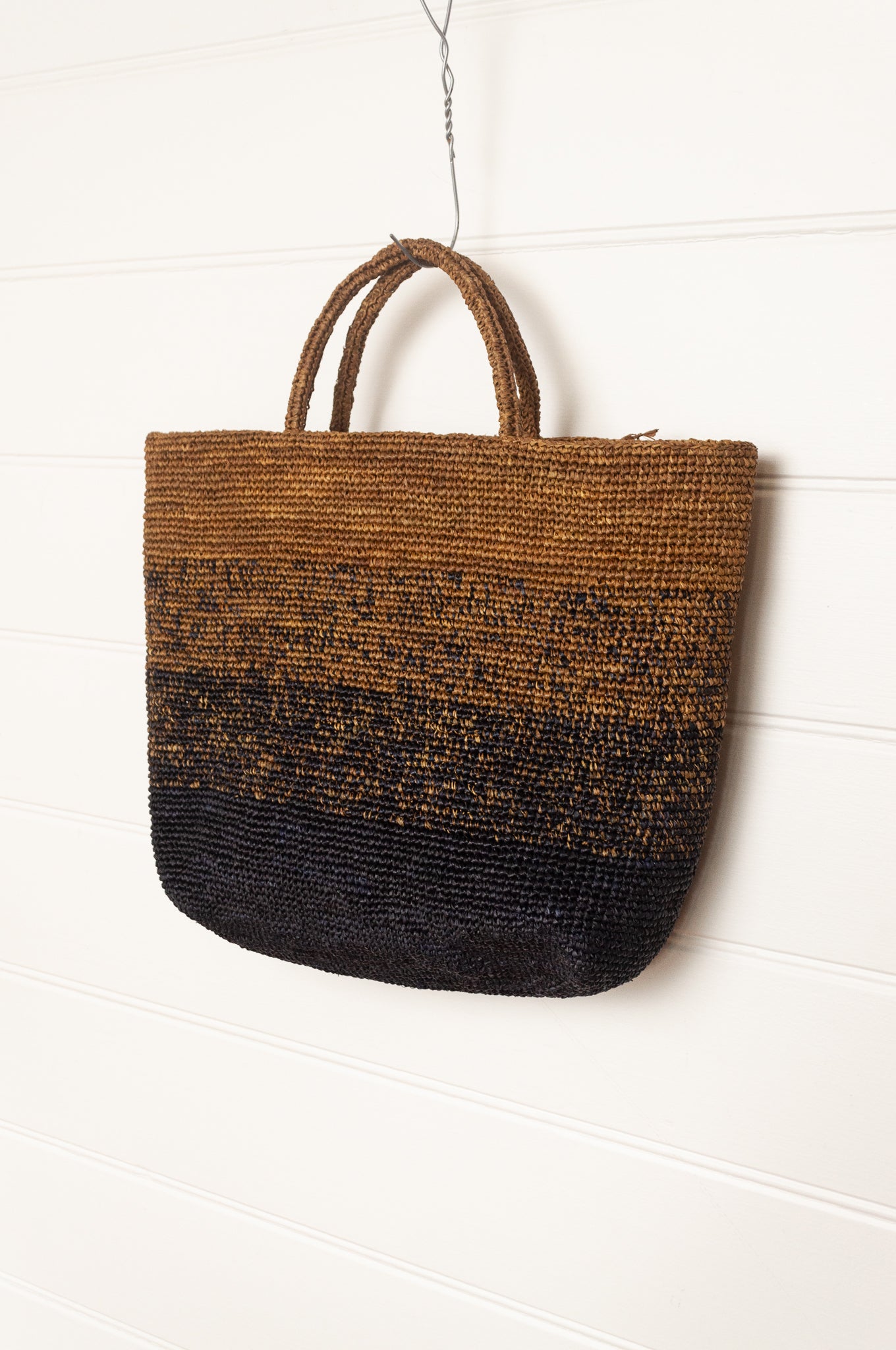 Sophie Digard large raffia tote bag in stripes of charcoal graphite and rich brown.