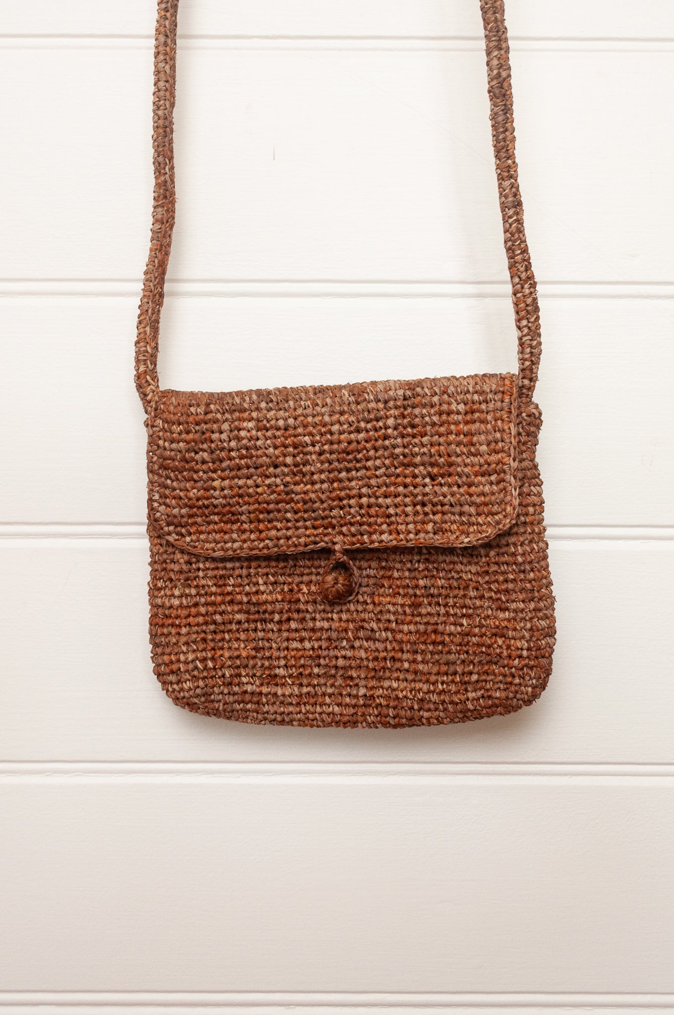 Sophie Digard small cross body crocheted raffia bag in mouflon marled warm browns.