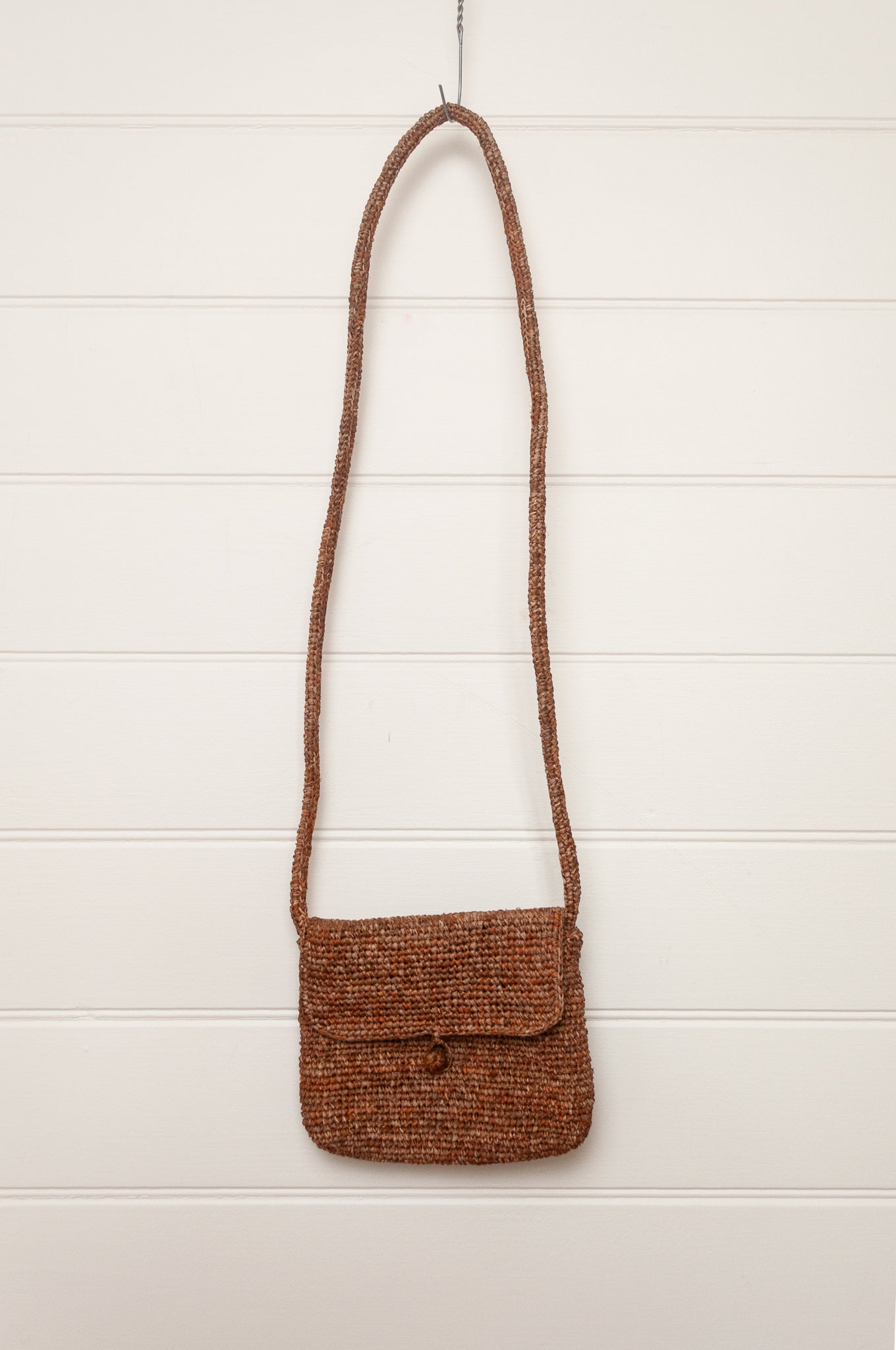 Sophie Digard small cross body crocheted raffia bag in mouflon marled warm browns.