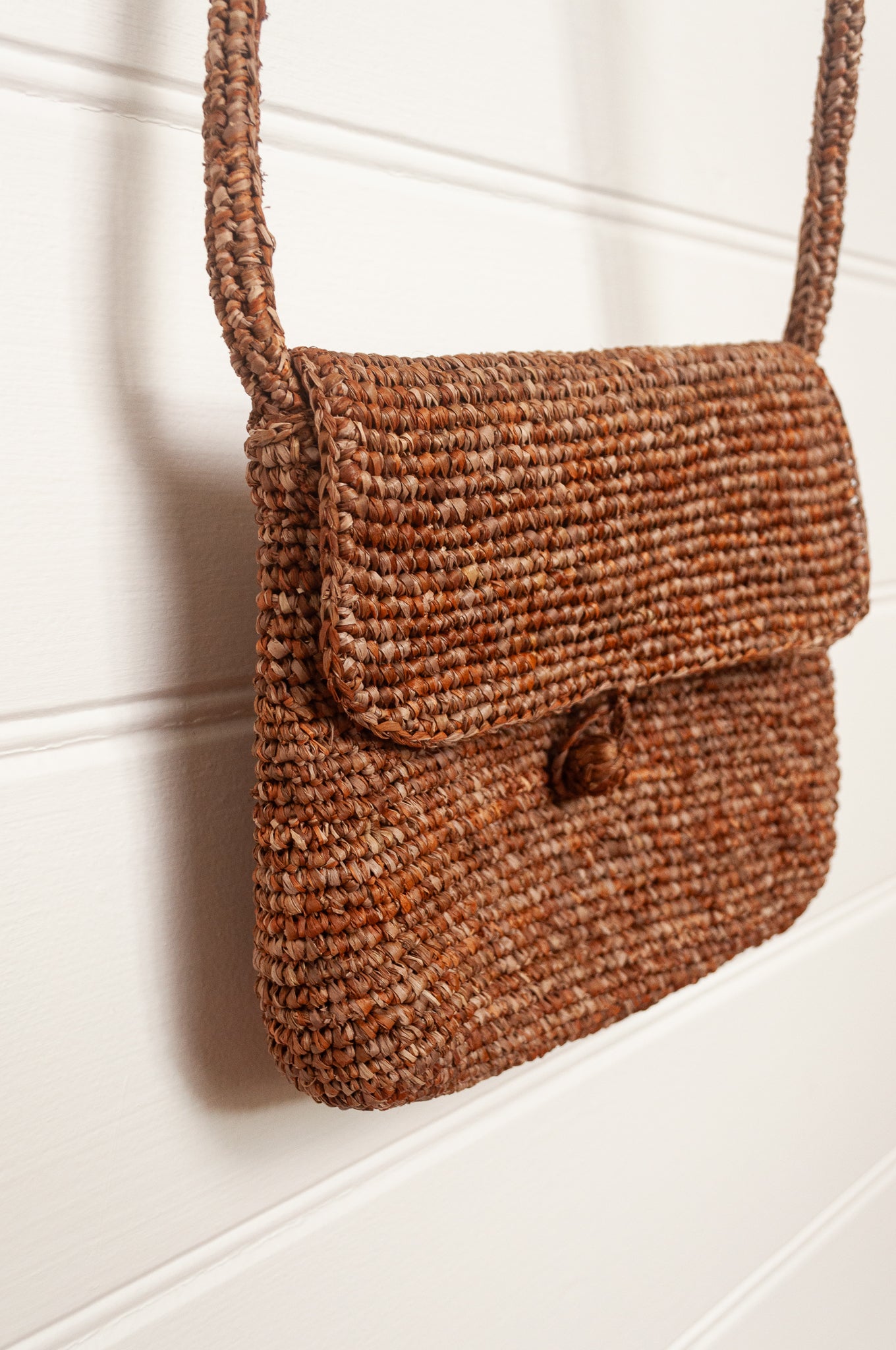 Sophie Digard small cross body crocheted raffia bag in mouflon marled warm browns.