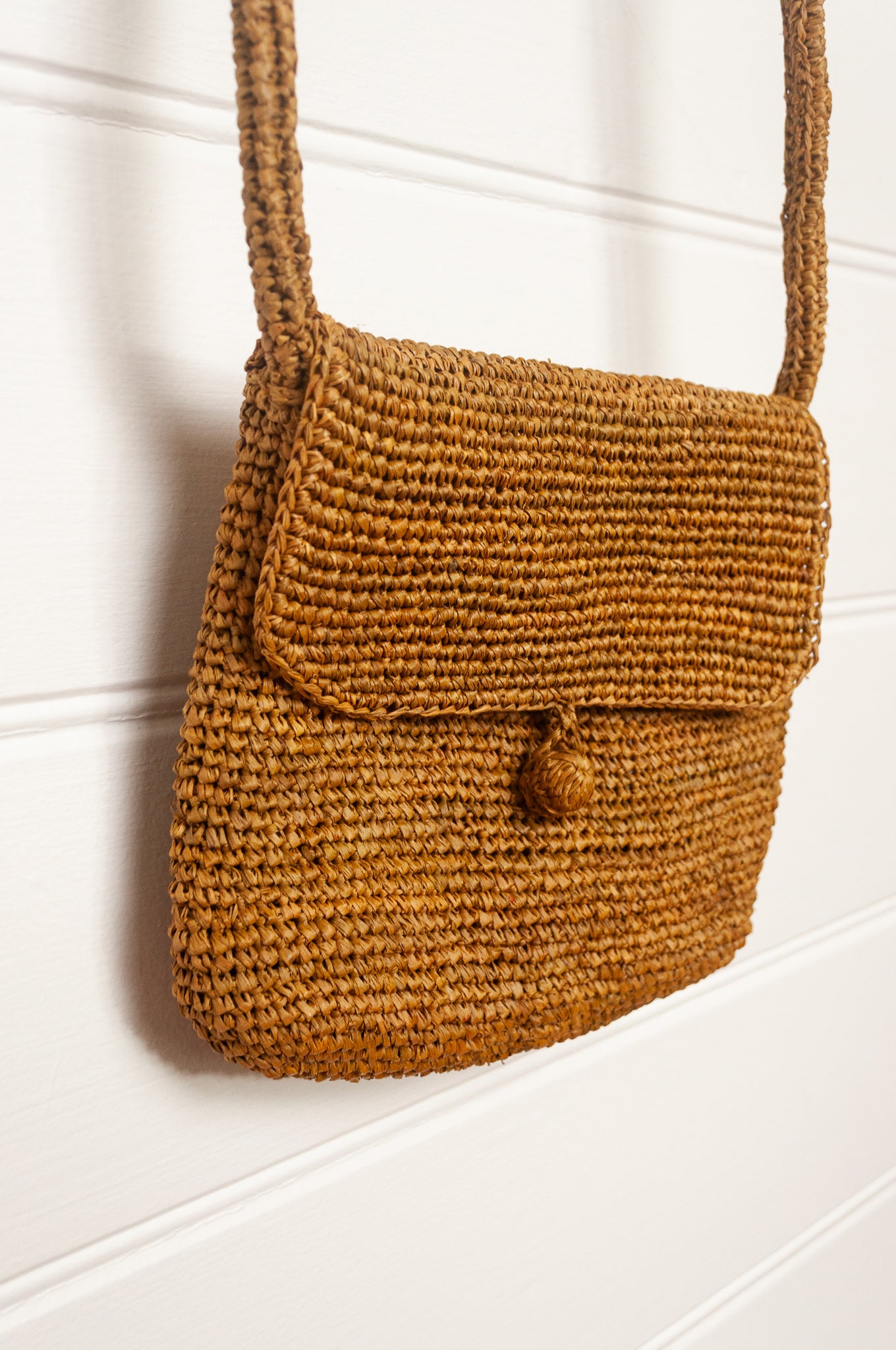 Sophie Digard small cross body crocheted raffia bag in oro golden brown.