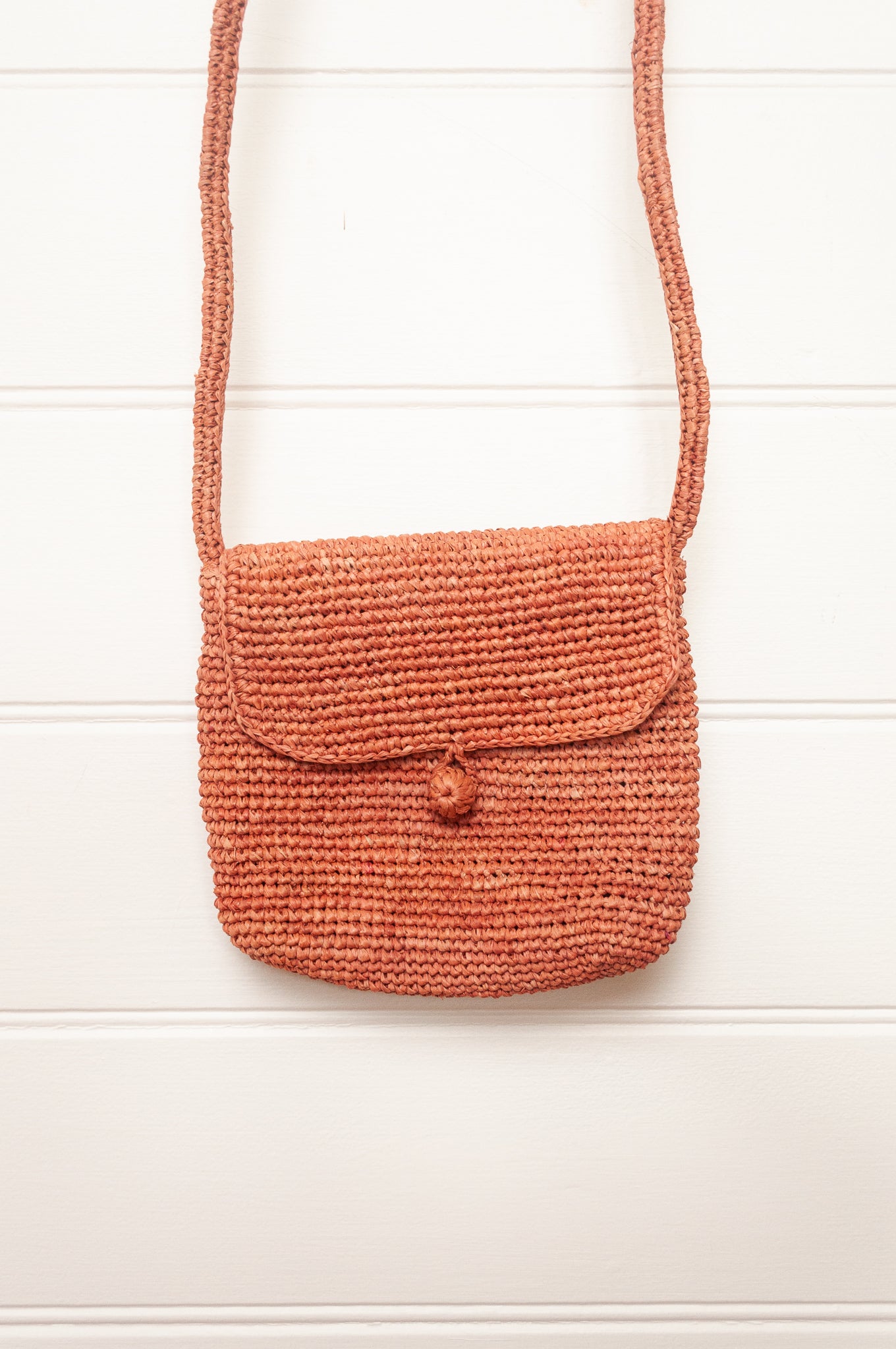 Sophie Digard small cross body crocheted raffia bag in bois de rose, warm pink.