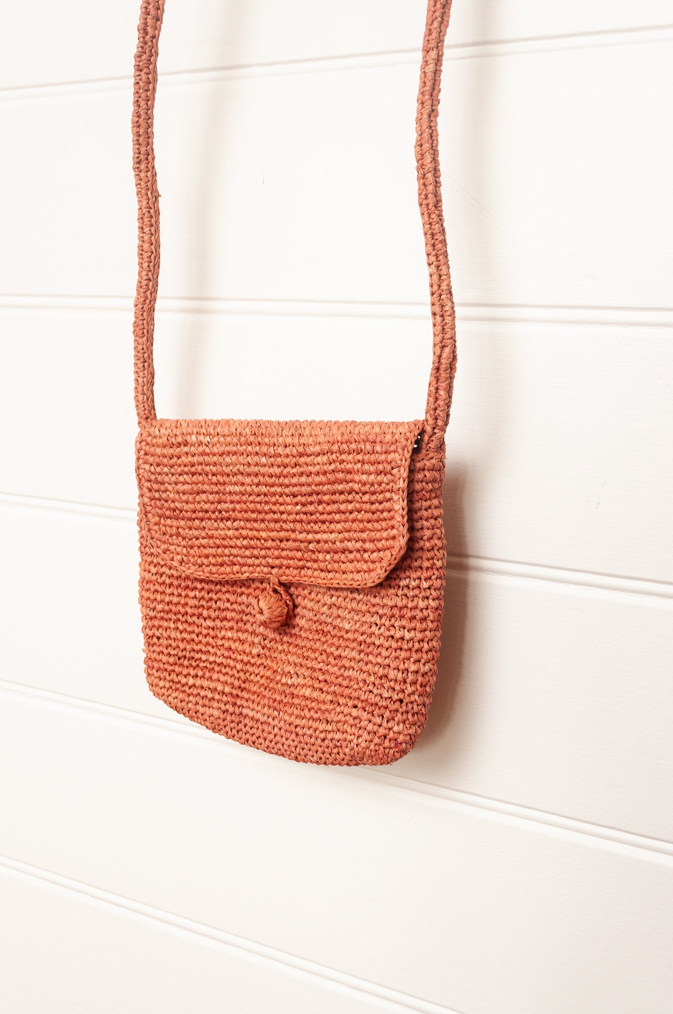 Sophie Digard small cross body crocheted raffia bag in bois de rose, warm pink.