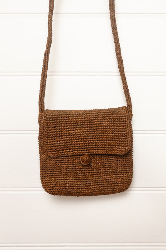 Sophie Digard small cross body crocheted raffia bag in tobacco brown.