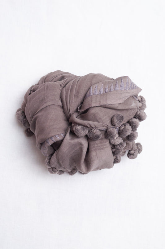 Silk cotton pom pom scarf in storm grey.