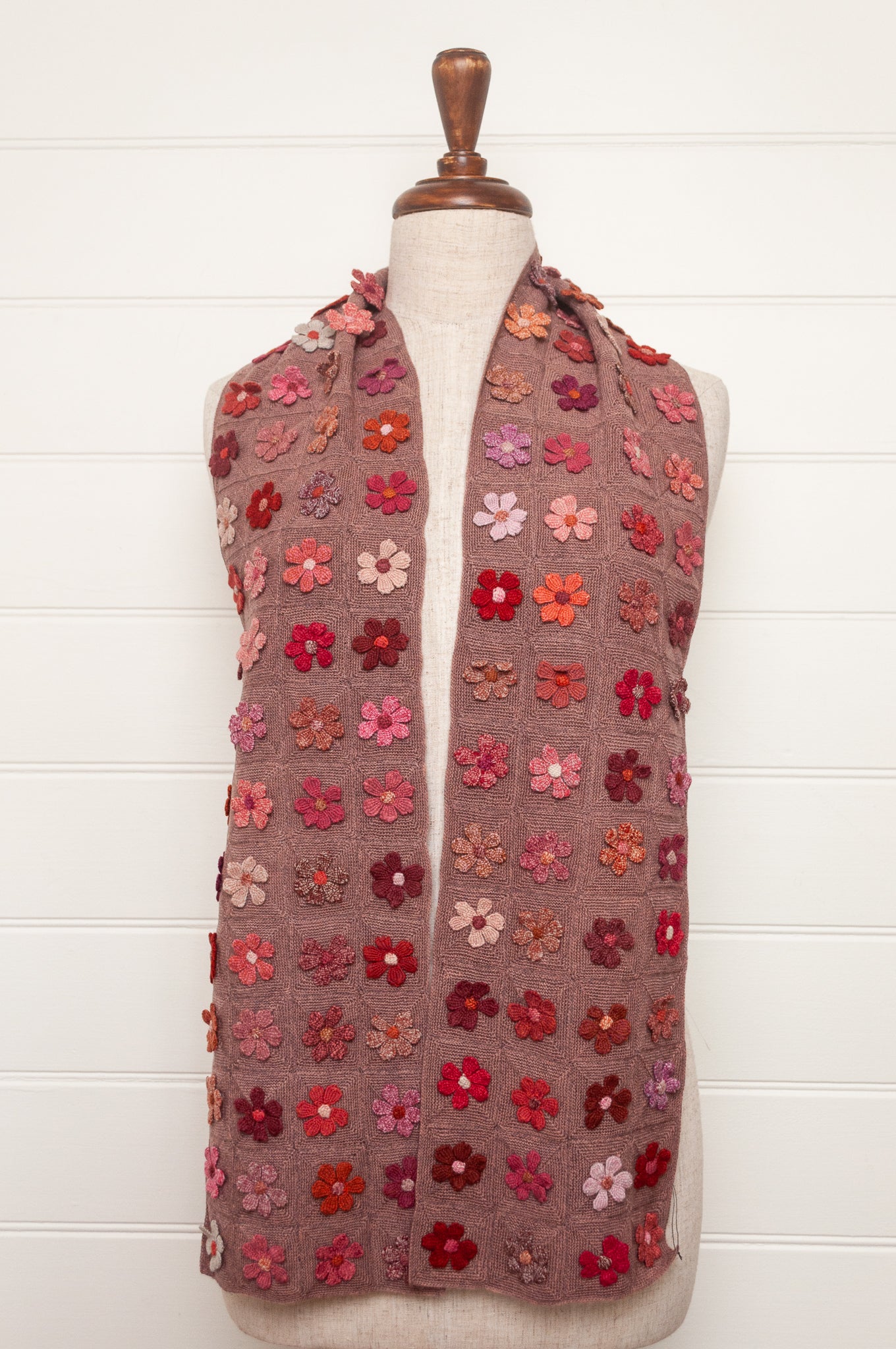 Sophie Digard flower sampler crocheted scarf in pinks and reds on bois de rose base.