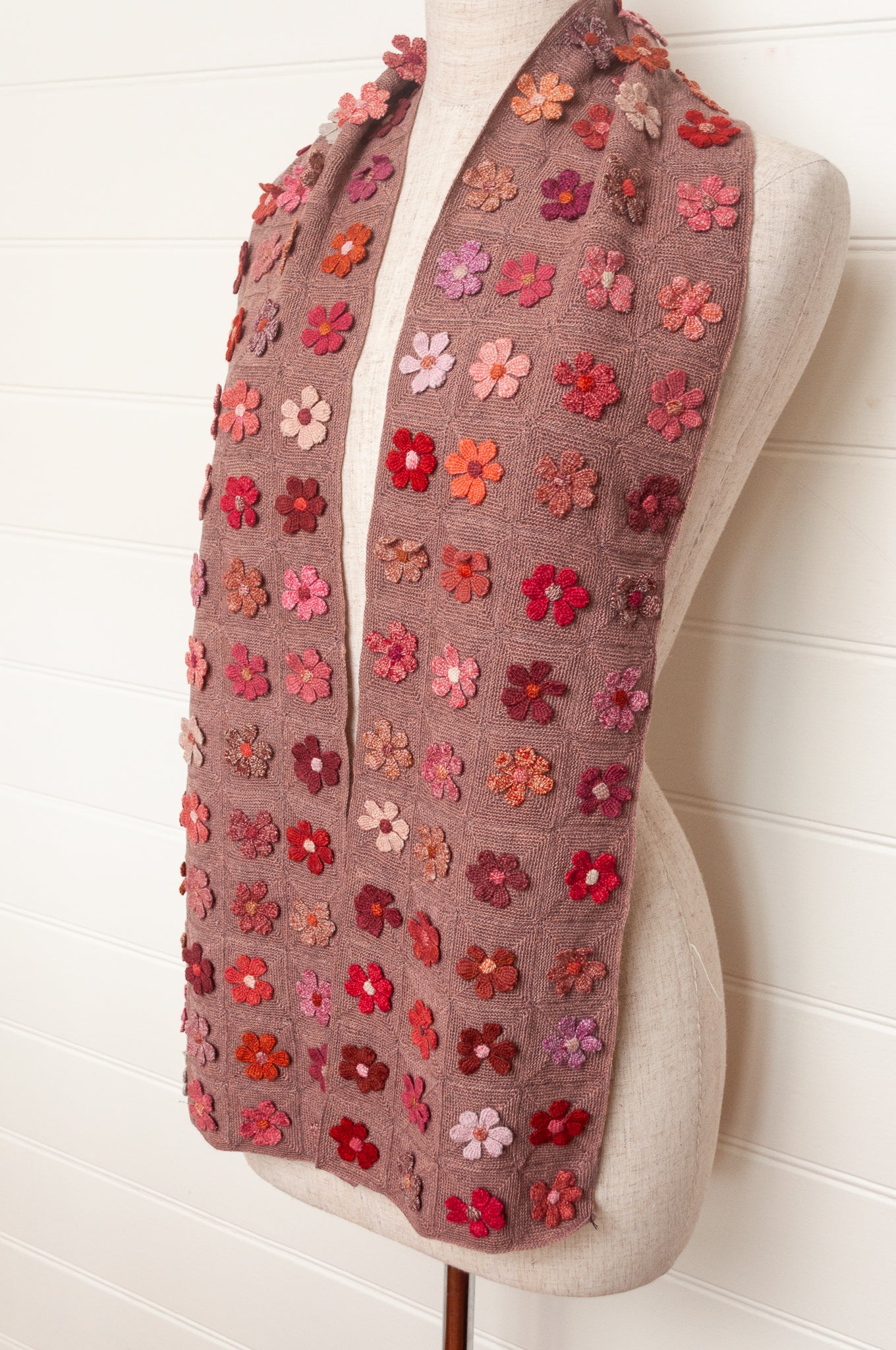 Sophie Digard flower sampler crocheted scarf in pinks and reds on bois de rose base.