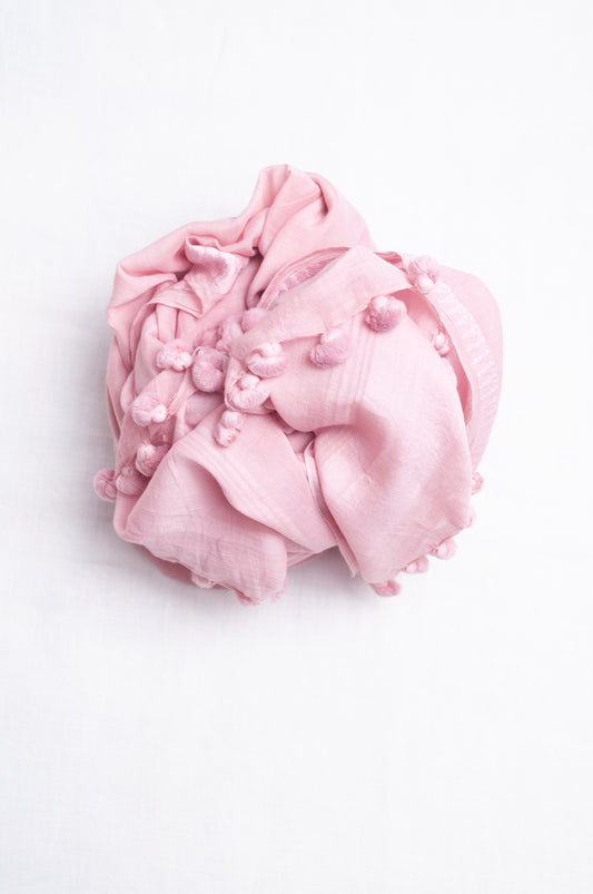 Silk cotton pom pom scarf in lavender pink.