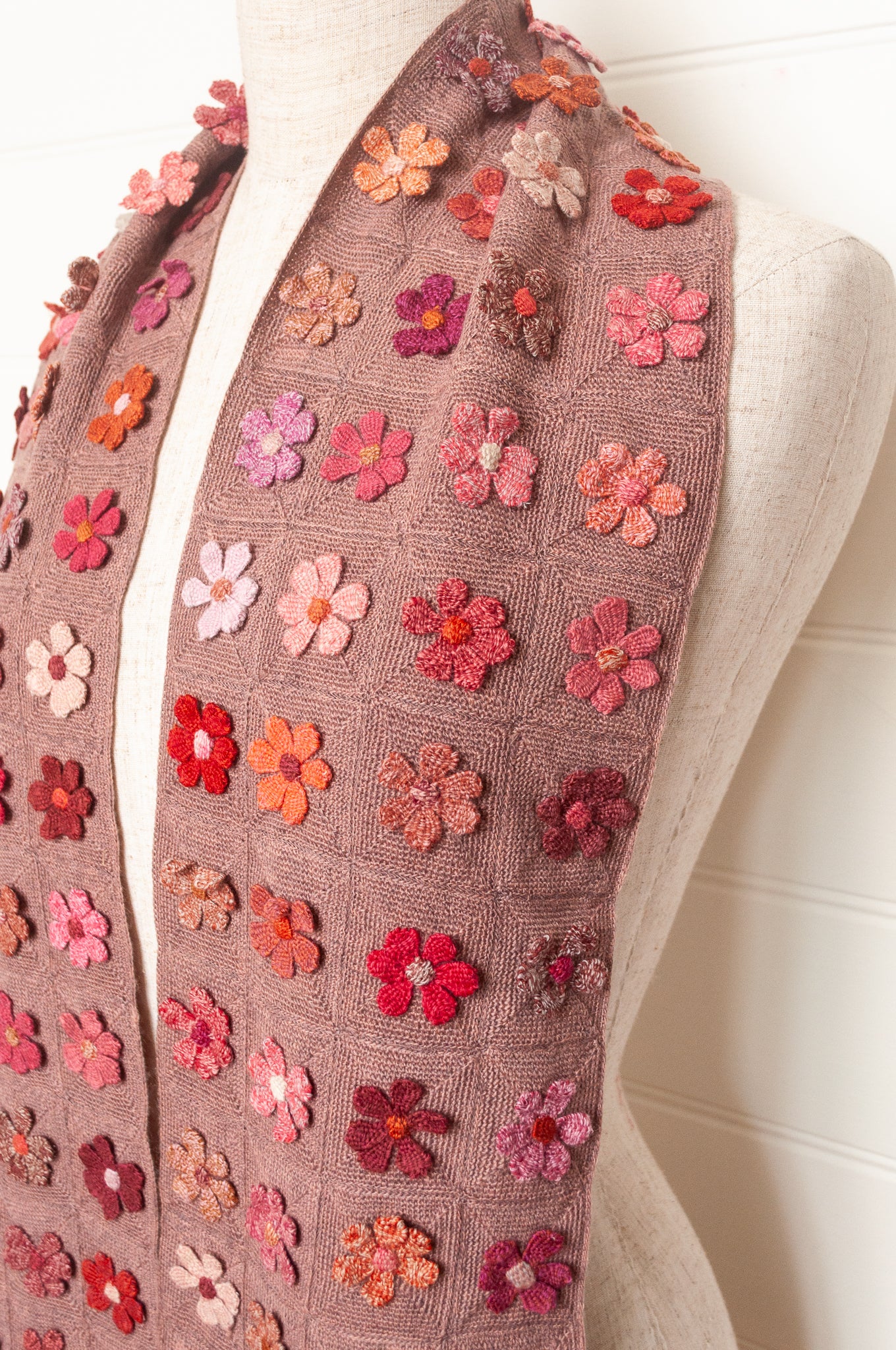 Sophie Digard flower sampler crocheted scarf in pinks and reds on bois de rose base.