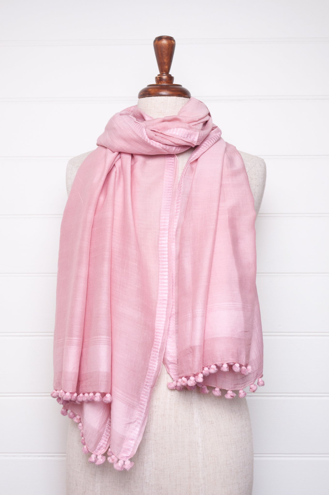 Silk cotton pom pom scarf in lavender pink.