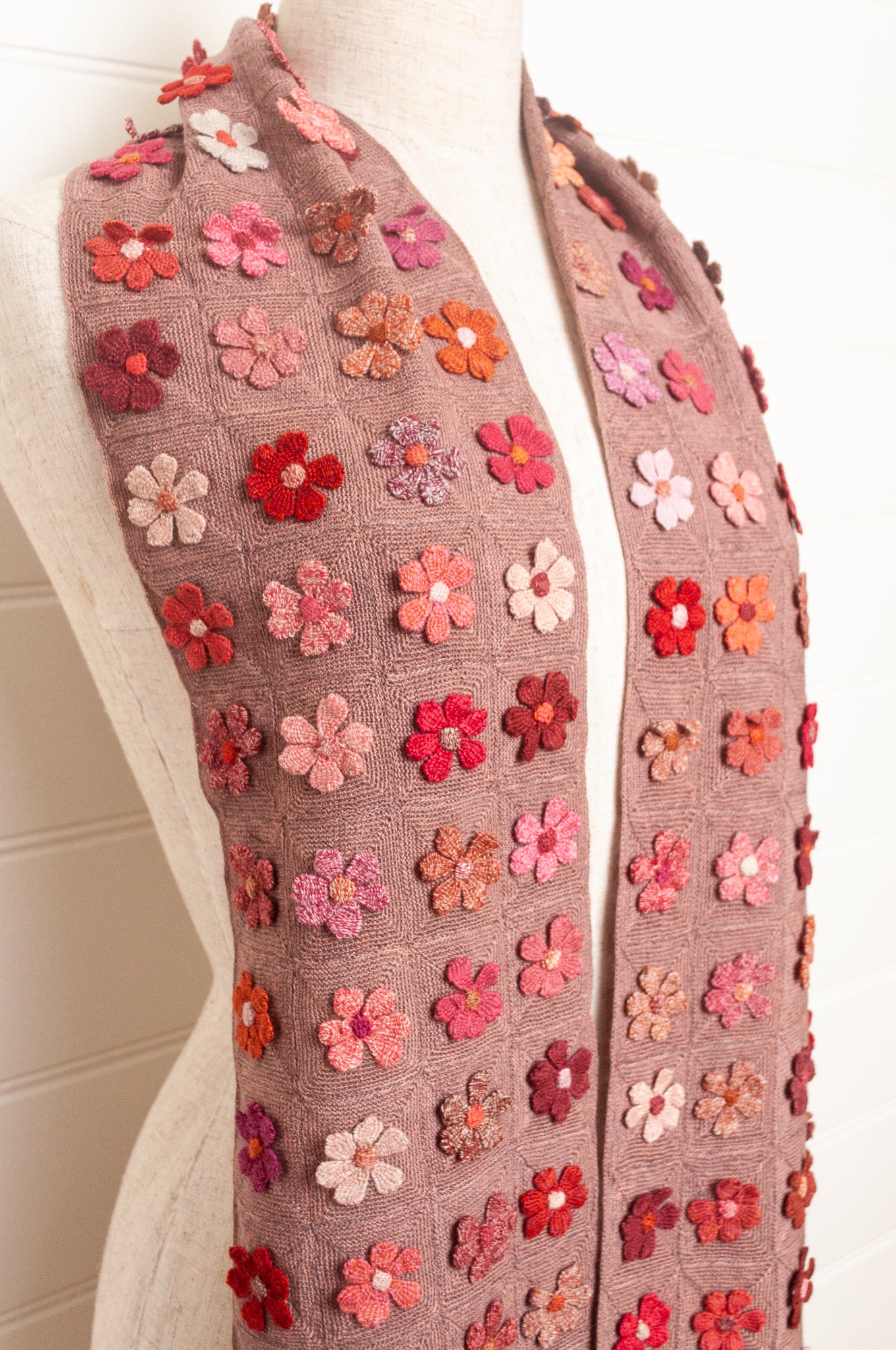 Sophie Digard flower sampler crocheted scarf in pinks and reds on bois de rose base.