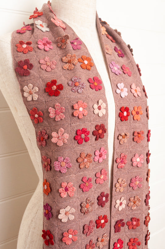 Sophie Digard flower sampler crocheted scarf in pinks and reds on bois de rose base.