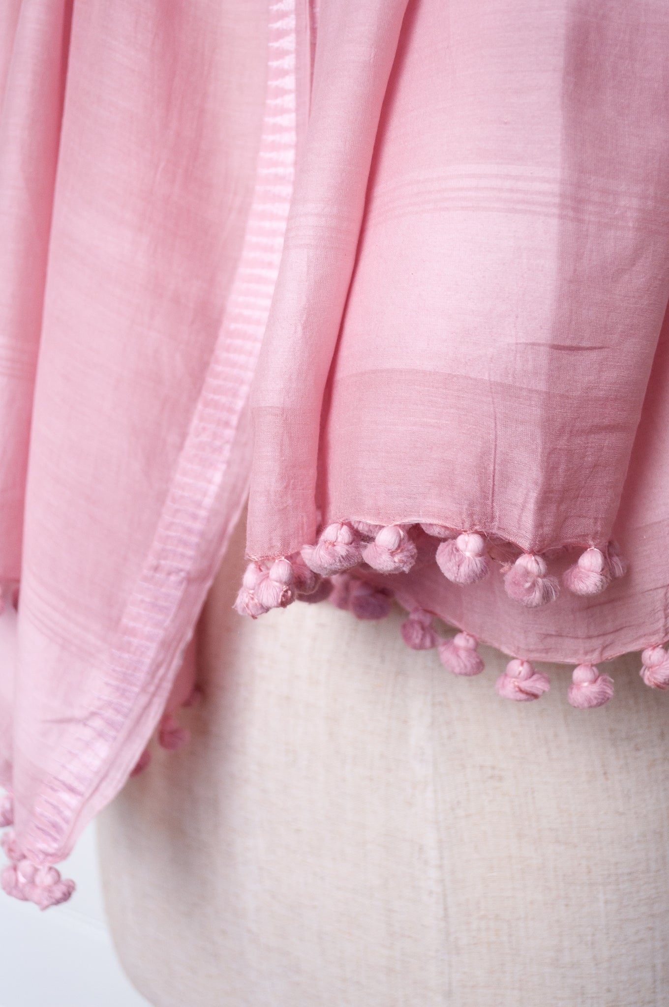 Silk cotton pom pom scarf in lavender pink.