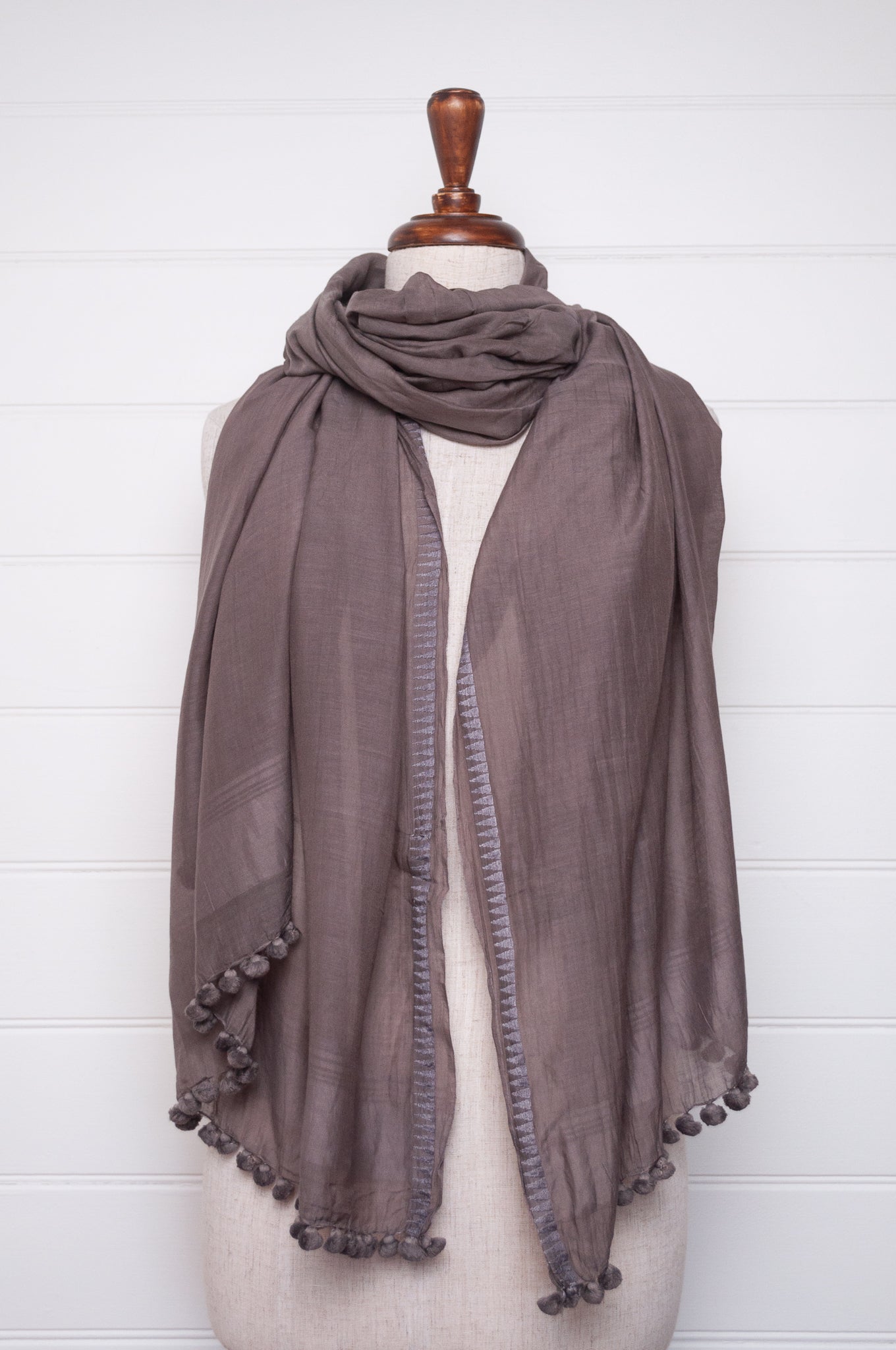 Silk cotton pom pom scarf in storm grey.