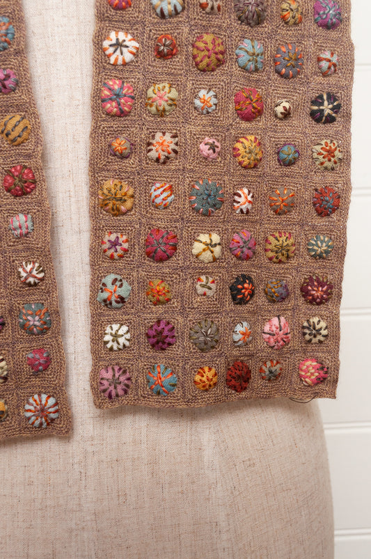 Sophie Digard  crocheted scarf of squares in nutmeg brown with multi-coloured embroidered fabric buttons.