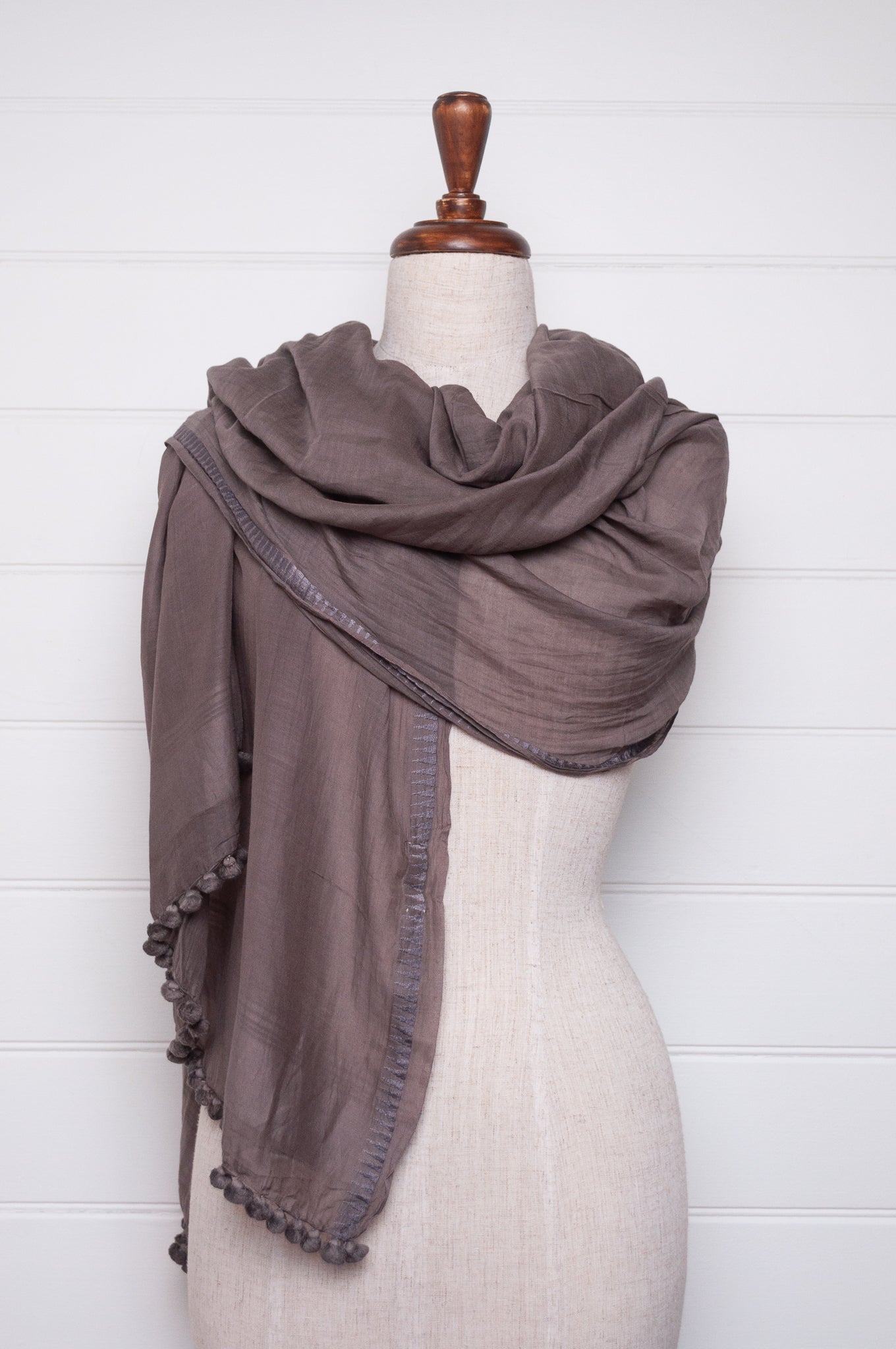 Silk cotton pom pom scarf in storm grey.