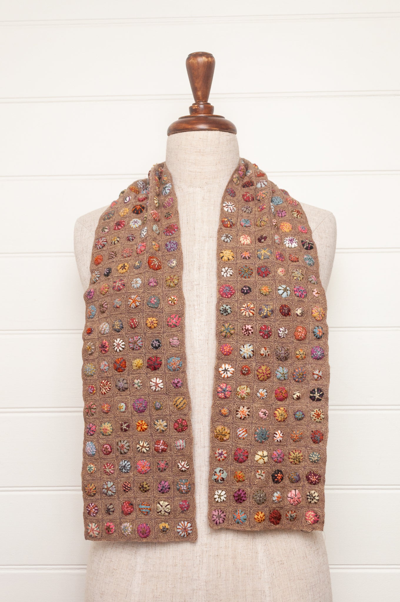 Sophie Digard  crocheted scarf of squares in nutmeg brown with multi-coloured embroidered fabric buttons.