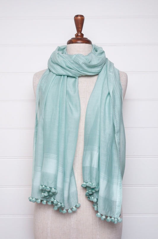 Silk cotton pom pom scarf in aquamarine.