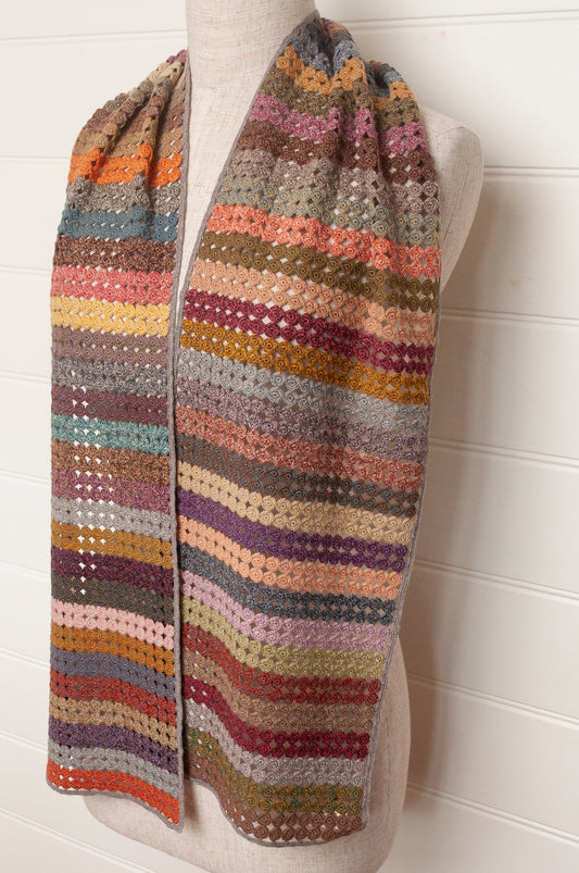 Sophie Digard crochet scarf of small circles in coloured stripes.