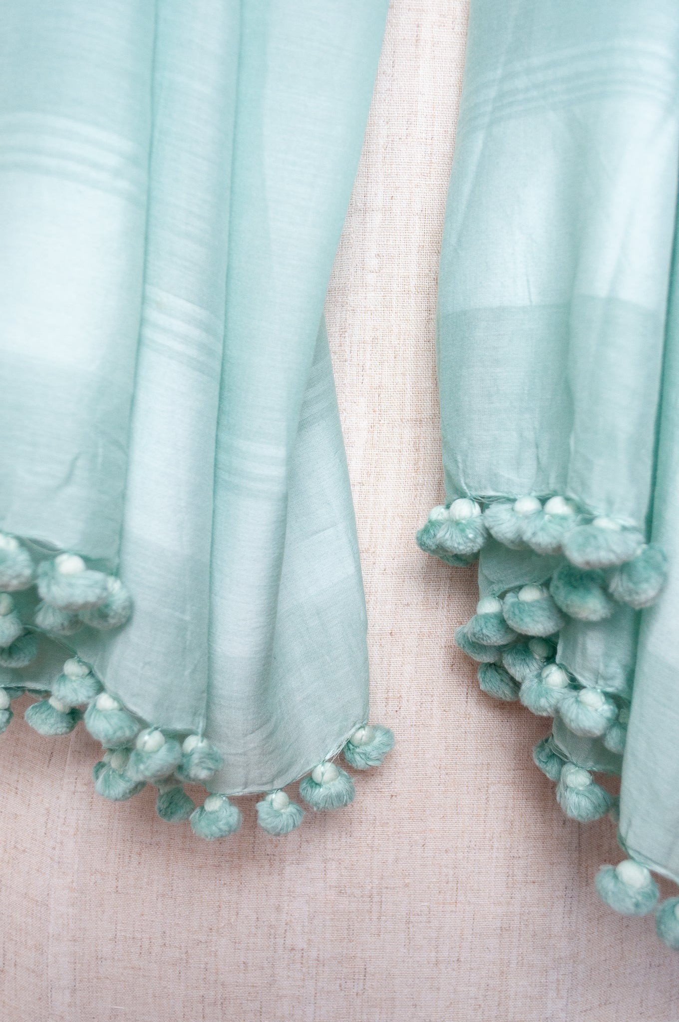Silk cotton pom pom scarf in aquamarine.