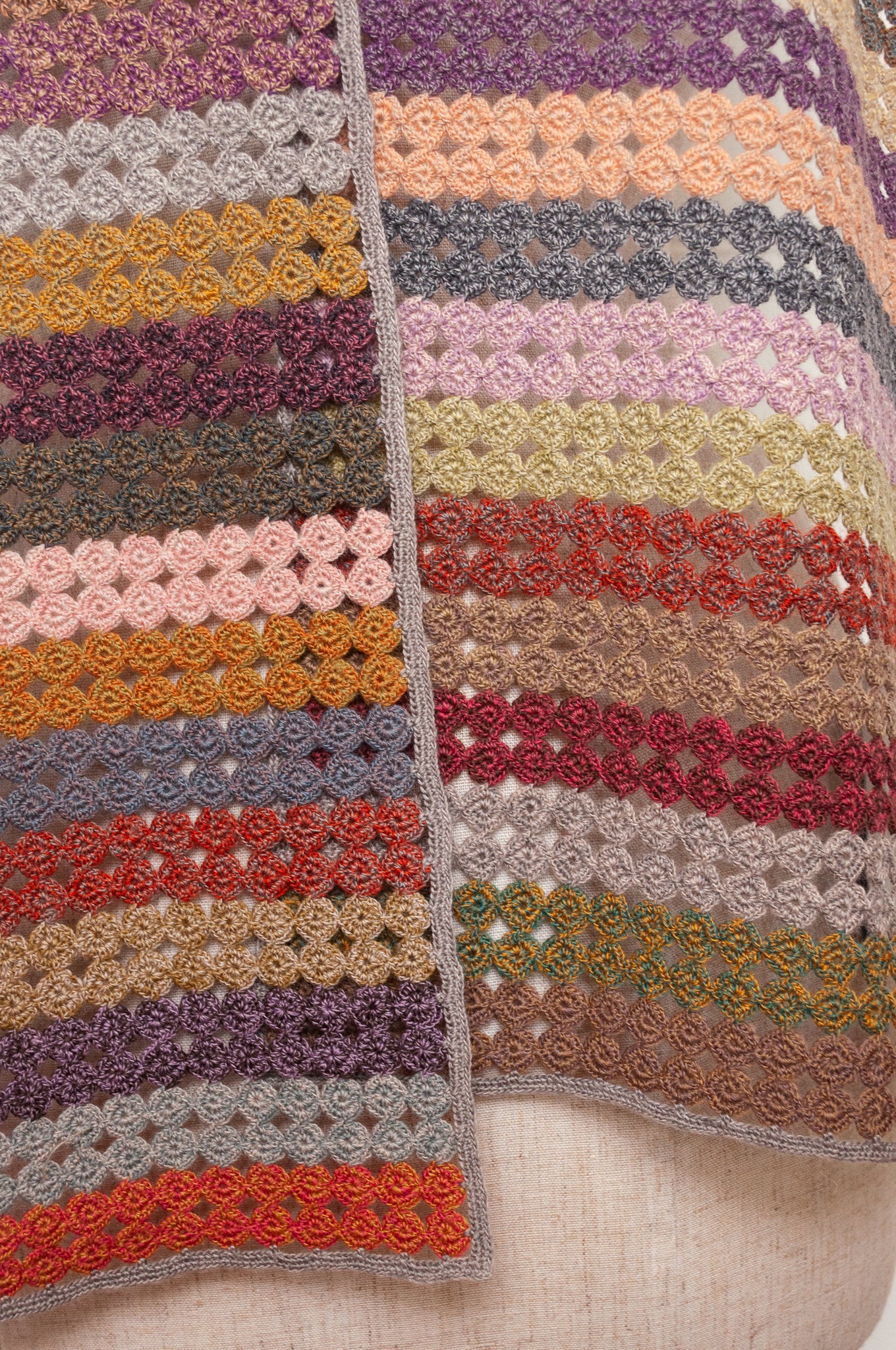 Sophie Digard crochet scarf of small circles in coloured stripes.
