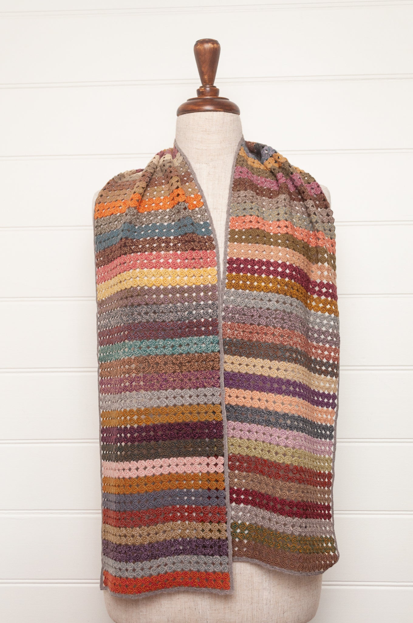 Sophie Digard crochet scarf of small circles in coloured stripes.