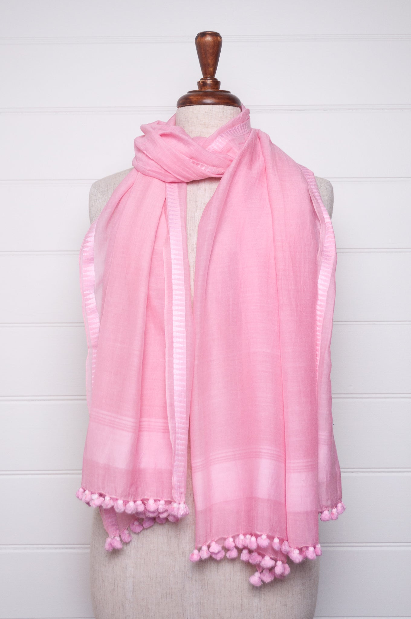 Silk cotton pom pom scarf in petal pink.