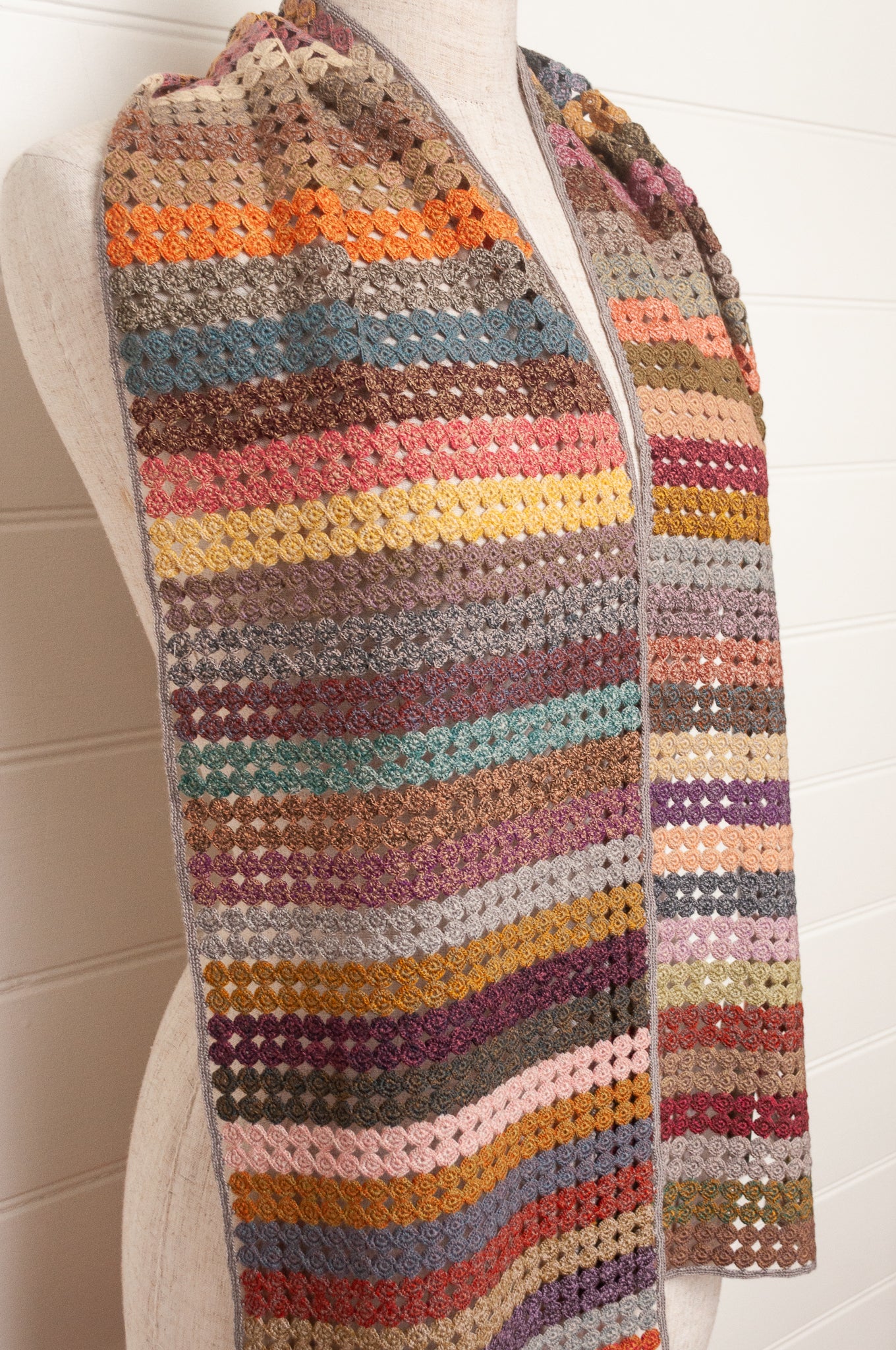Sophie Digard crochet scarf of small circles in coloured stripes.