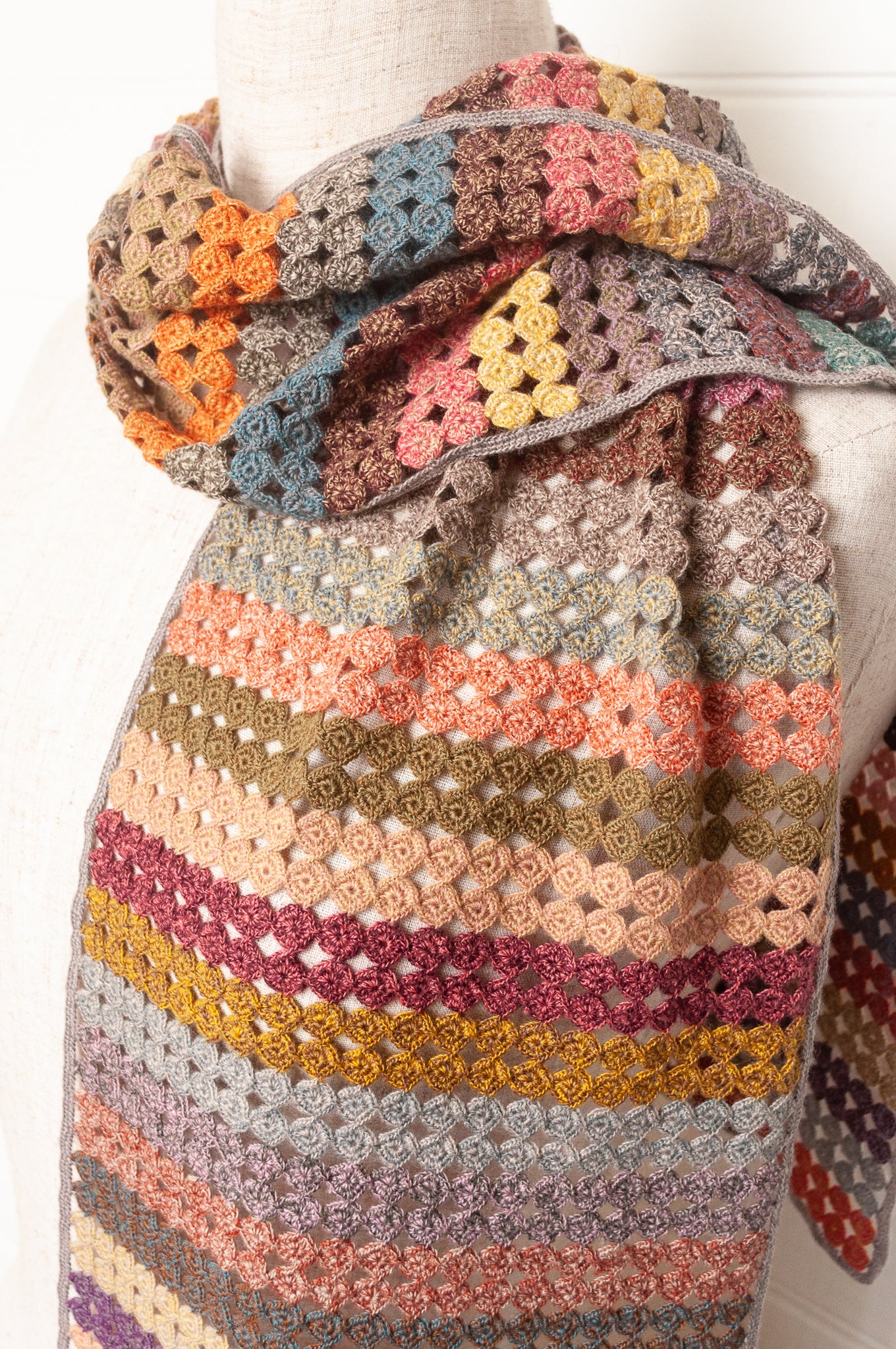 Sophie Digard crochet scarf of small circles in coloured stripes.