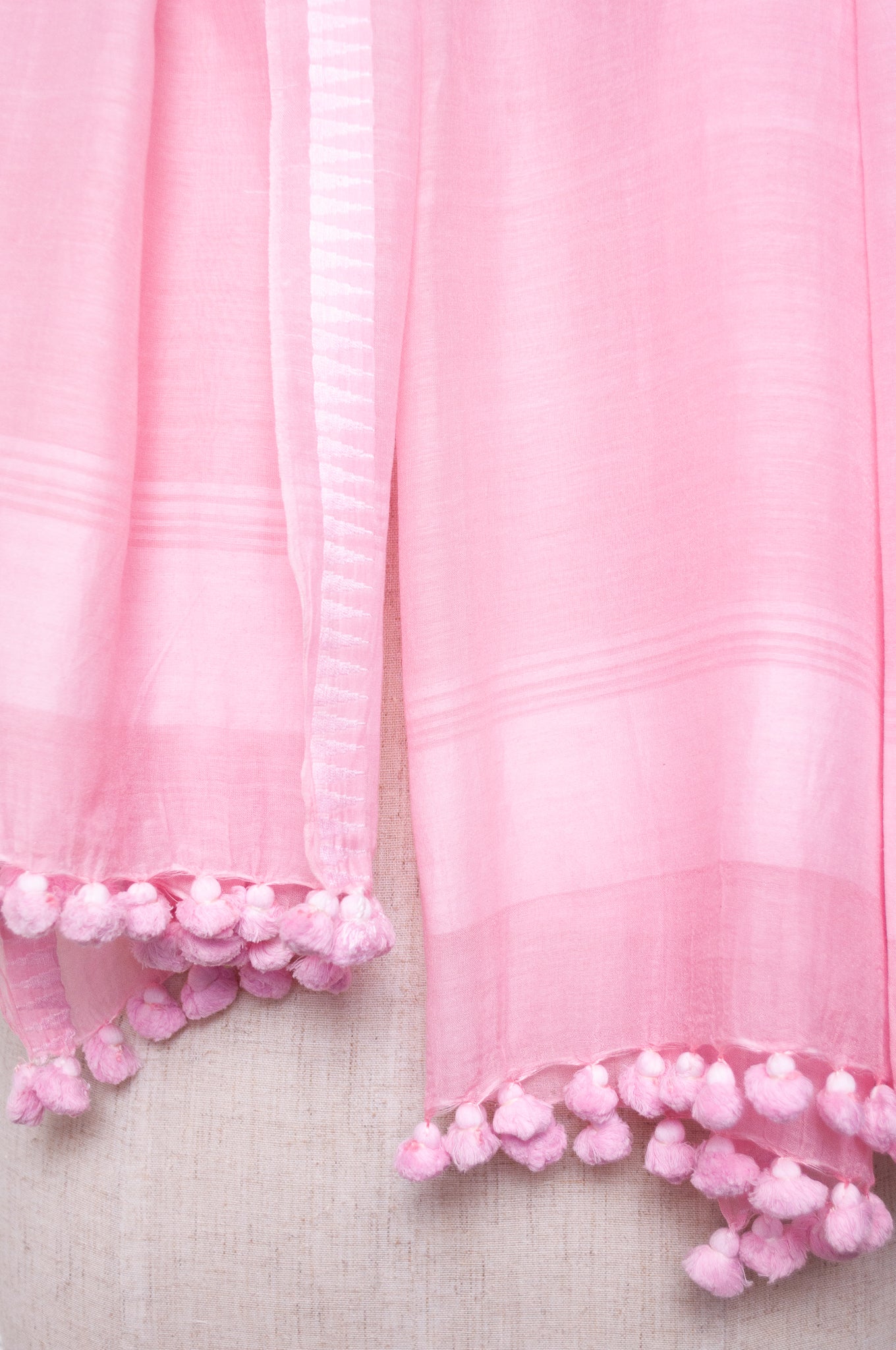 Silk cotton pom pom scarf in petal pink.