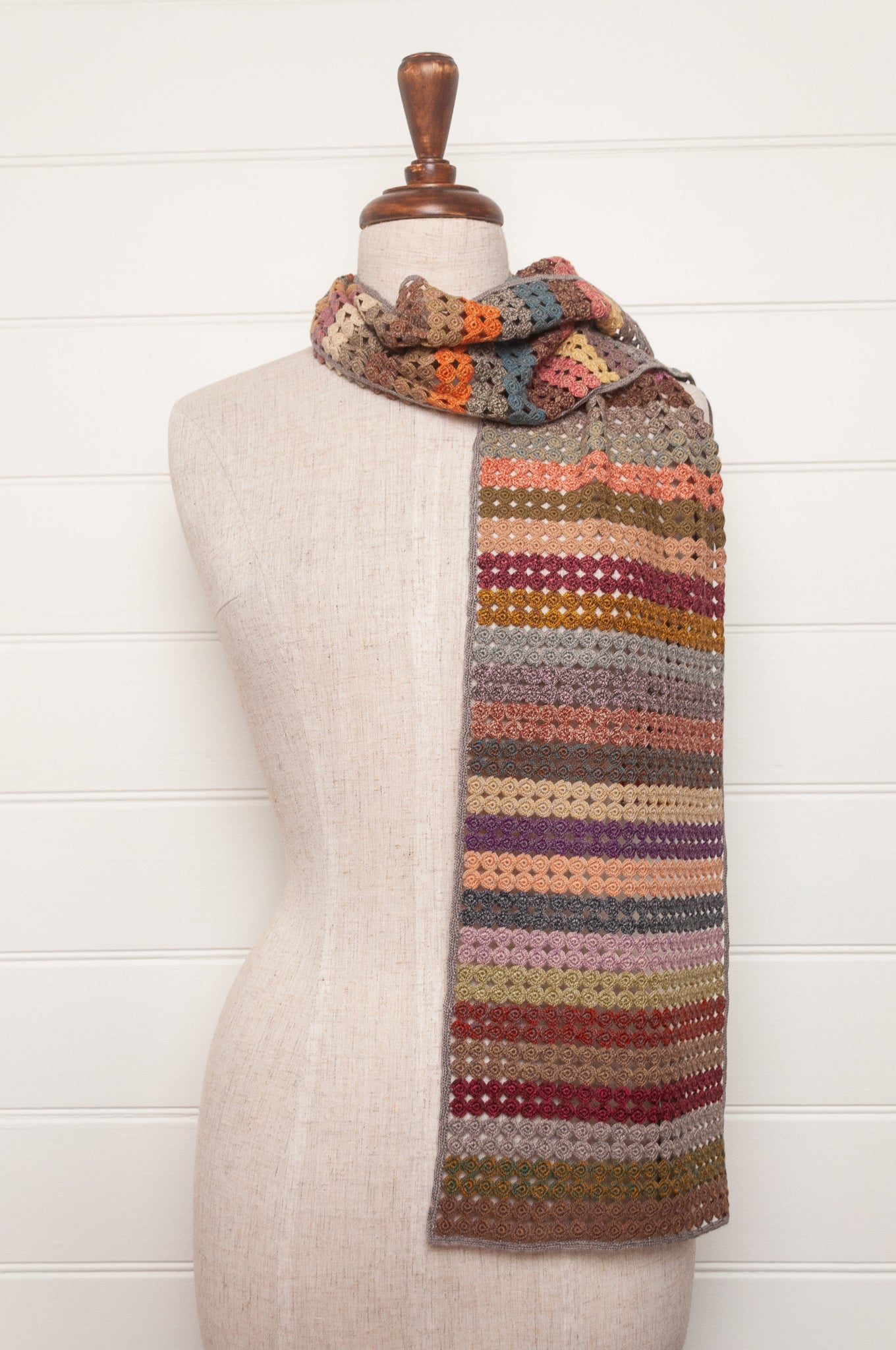 Sophie Digard crochet scarf of small circles in coloured stripes.