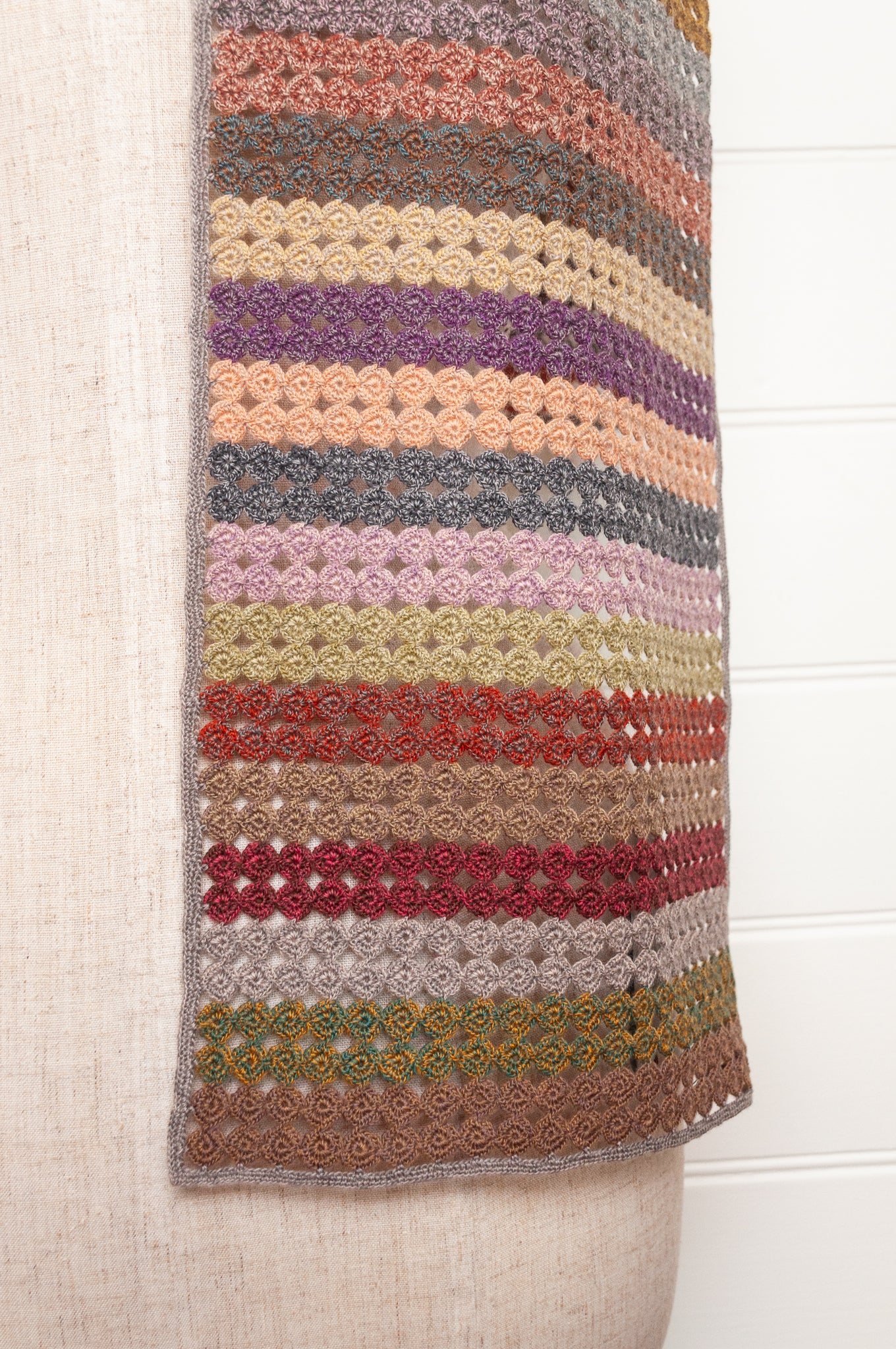 Sophie Digard crochet scarf of small circles in coloured stripes.