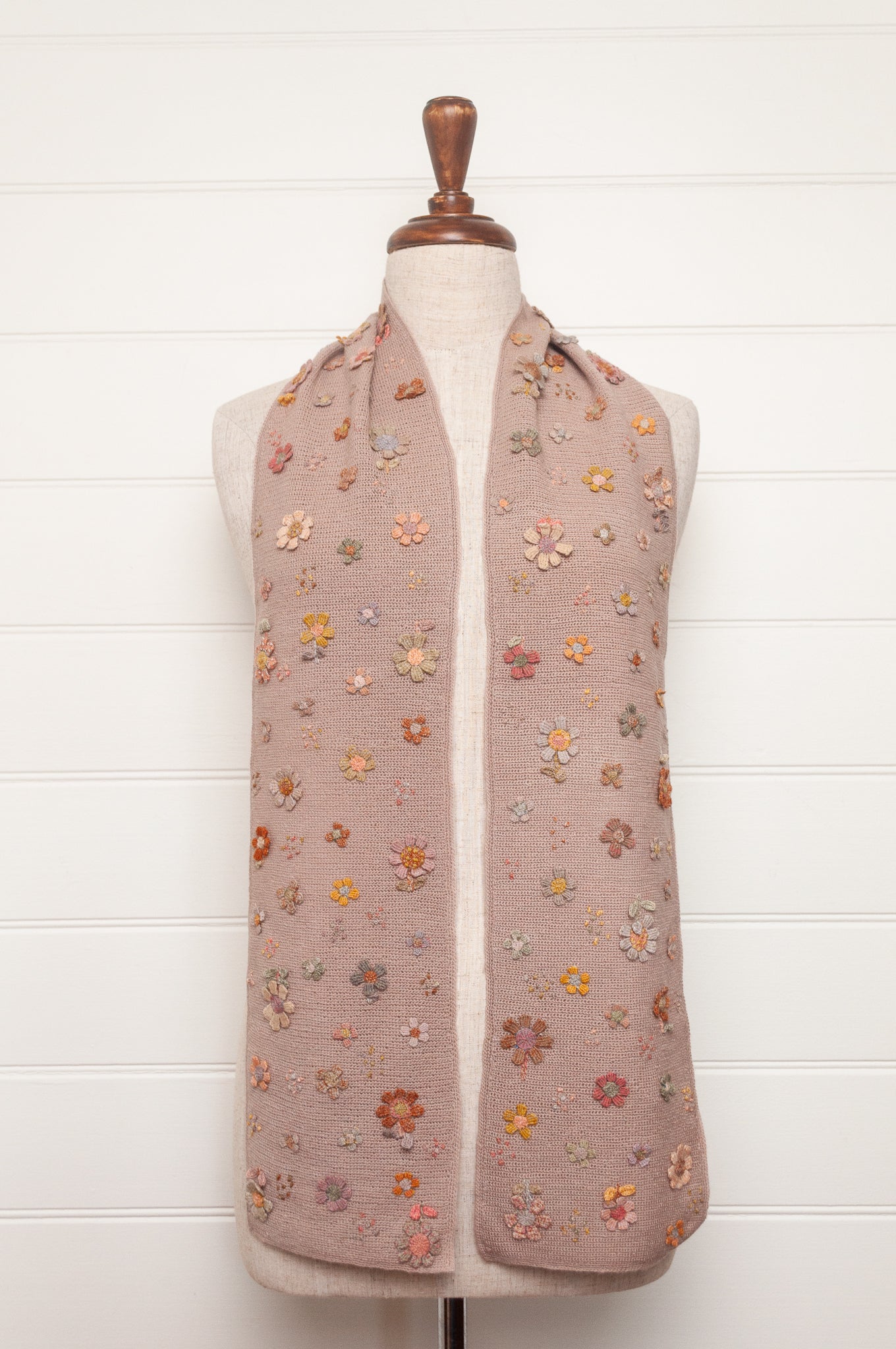 Sophie Digard flower sampler crocheted scarf in soft pastel palette on lilac base.