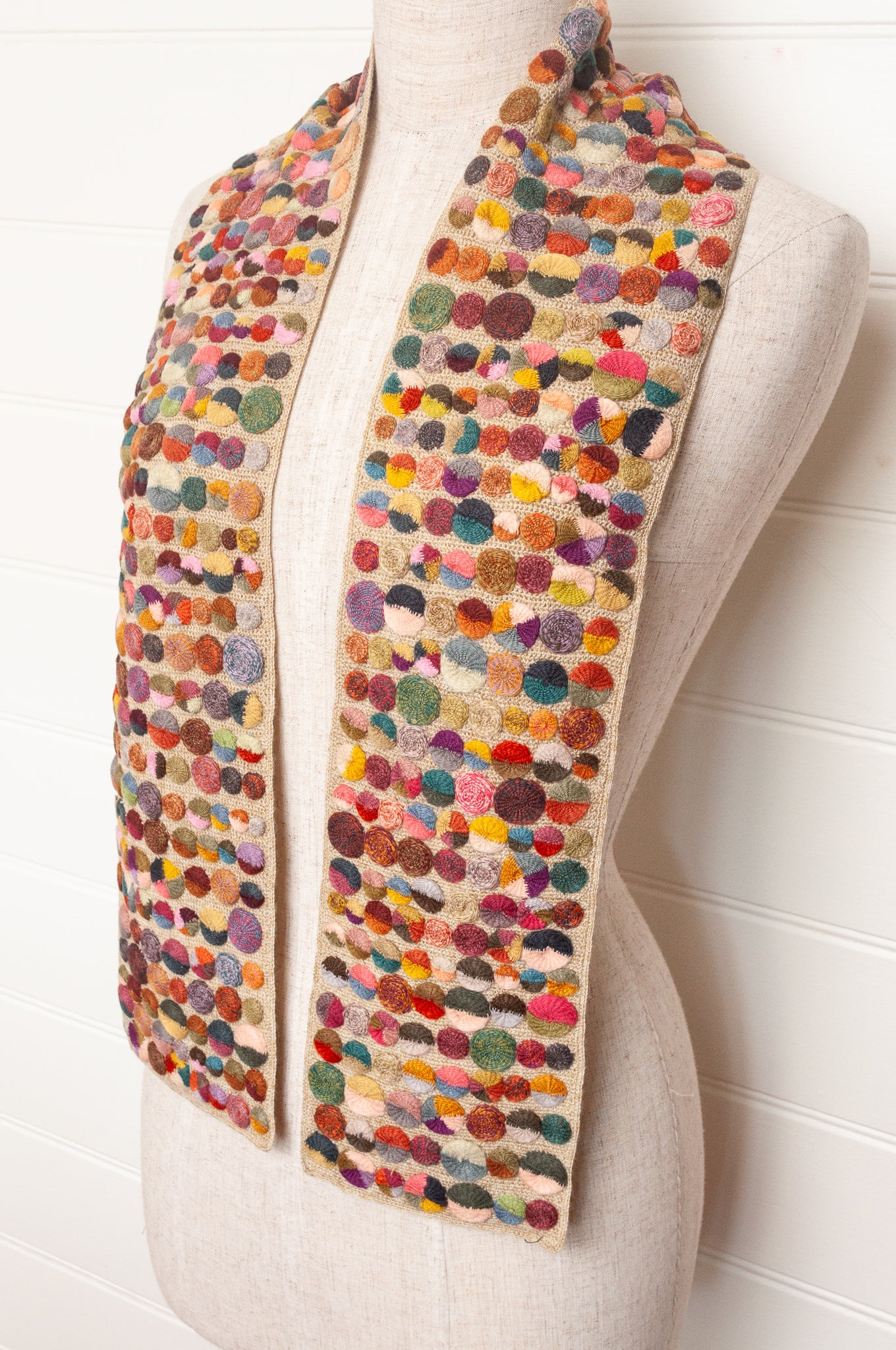 Sophie Digard crochet scarf of multi coloured medallions on natural base.
