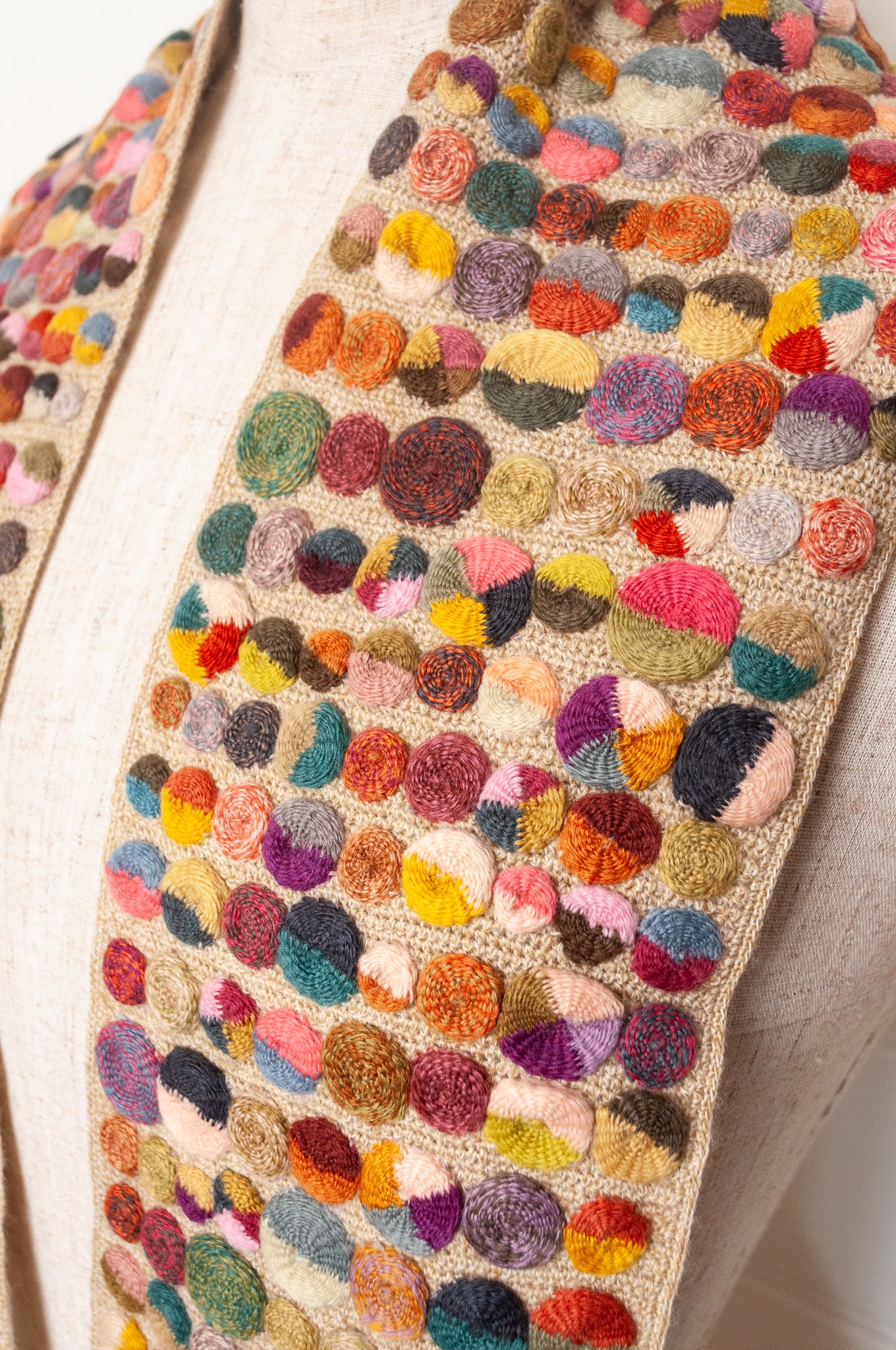 Sophie Digard crochet scarf of multi coloured medallions on natural base.