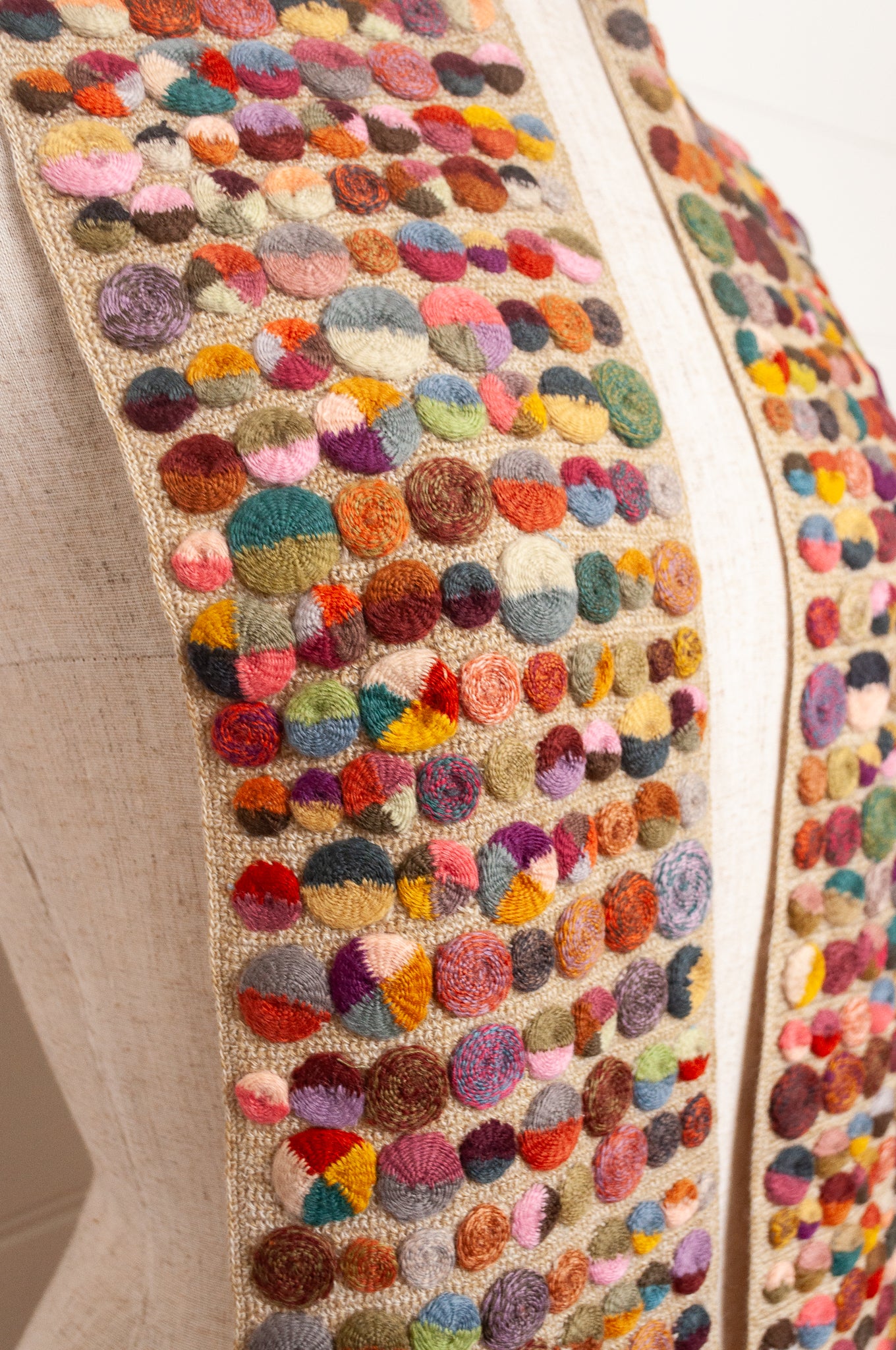 Sophie Digard crochet scarf of multi coloured medallions on natural base.