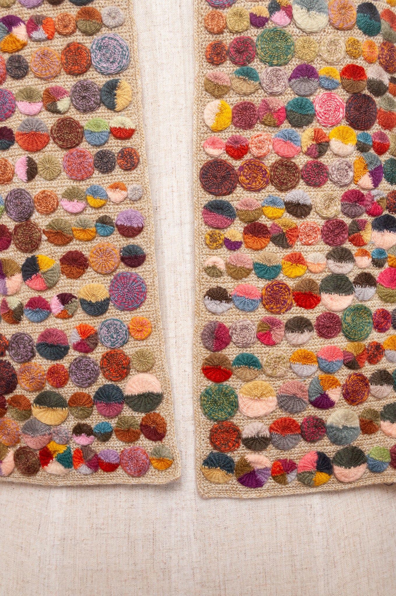 Sophie Digard crochet scarf of multi coloured medallions on natural base.