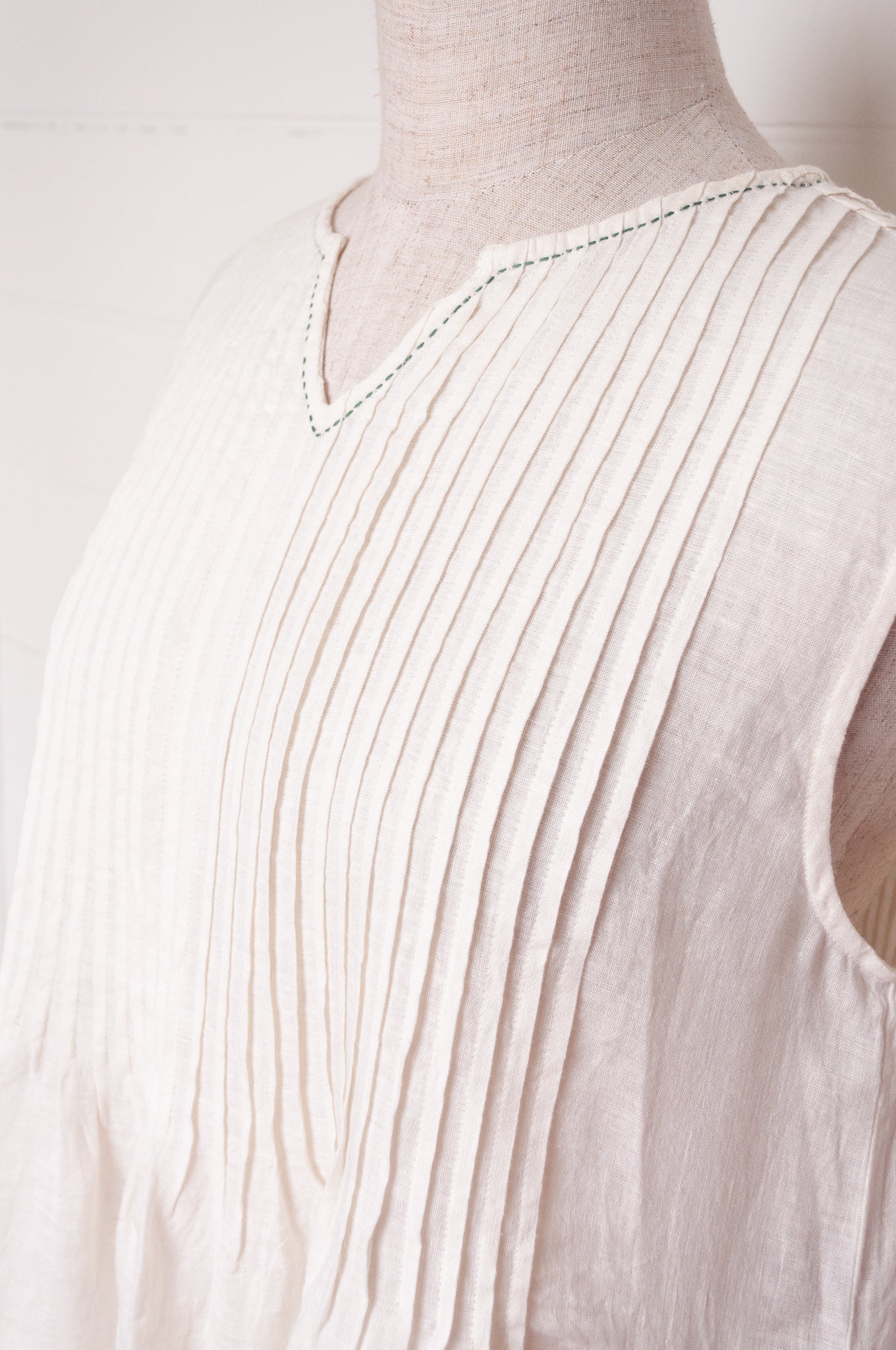 DVE Bhavya natural white linen sleeveless pintucked sun dress.