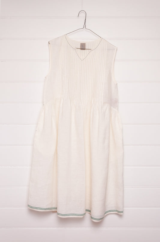 DVE Bhavya natural white linen sleeveless pintucked sun dress.