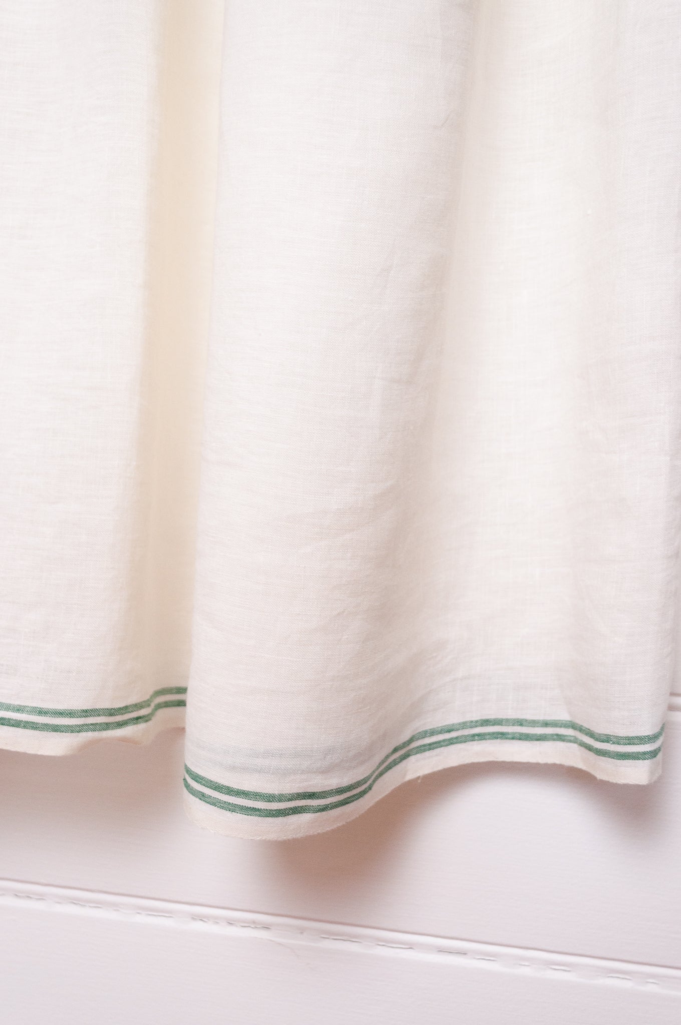 DVE Bhavya natural white linen sleeveless pintucked sun dress.