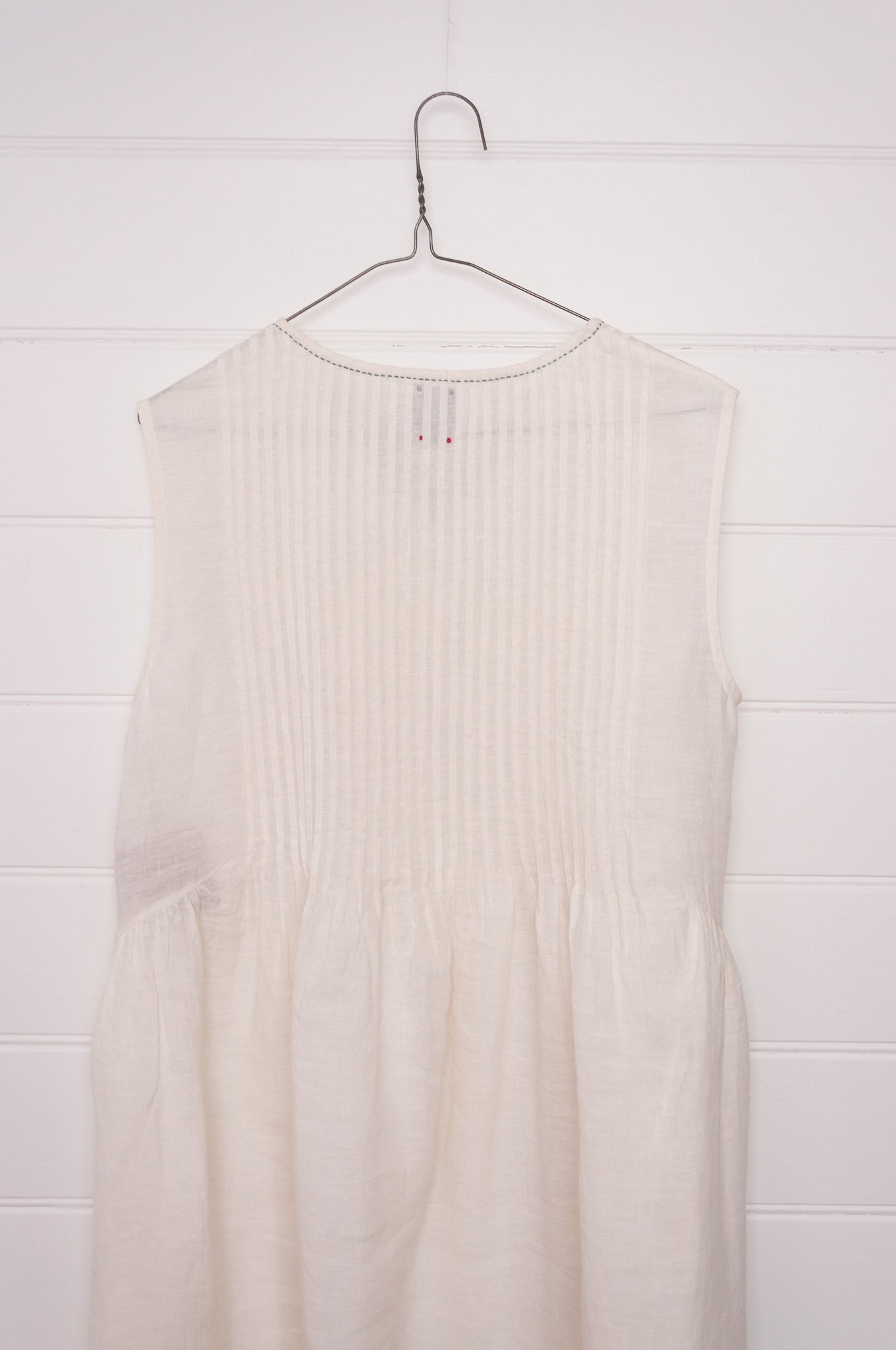 DVE Bhavya natural white linen sleeveless pintucked sun dress.