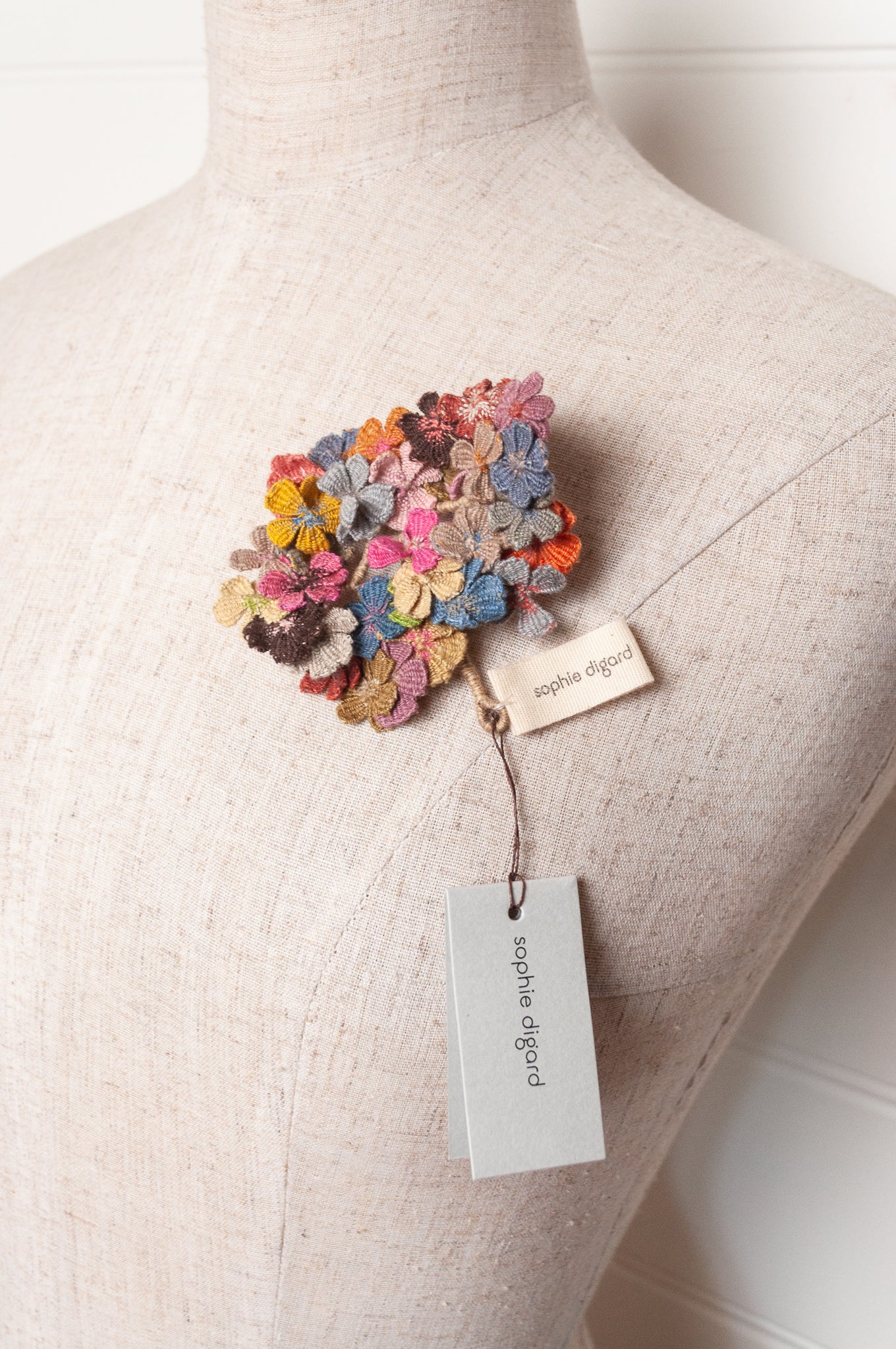 Sophie Digard multicoloured crochet floral brooch.
