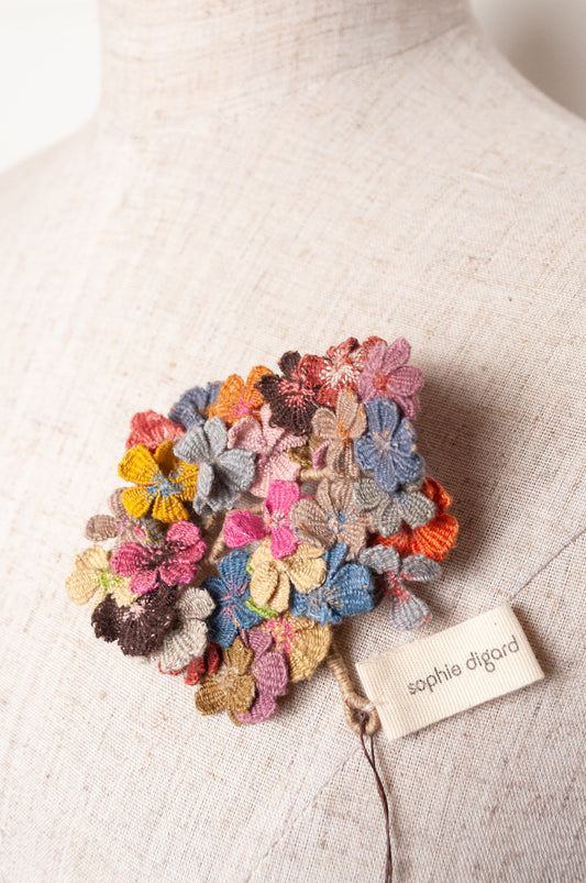 Sophie Digard multicoloured crochet floral brooch.