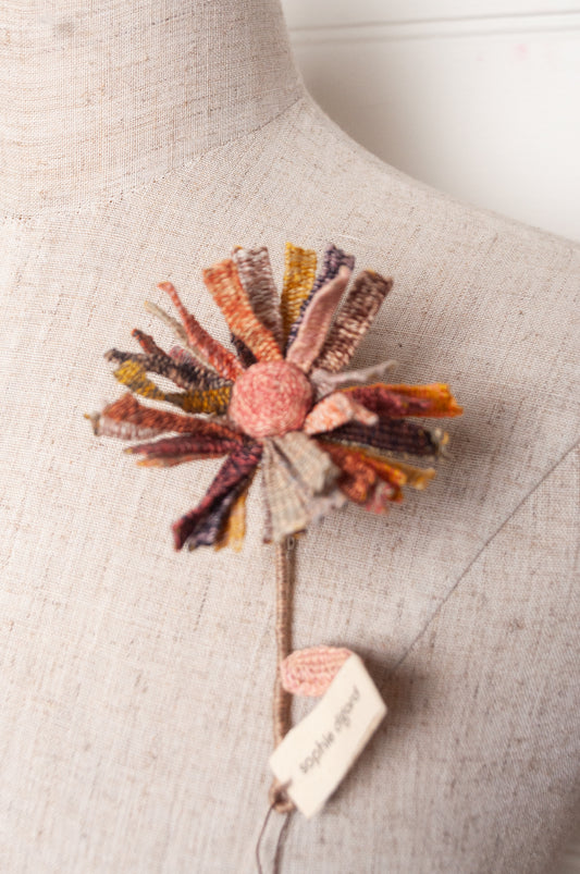 Sophie Digard multicoloured crochet flower brooch.