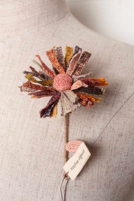 Sophie Digard multicoloured crochet flower brooch.