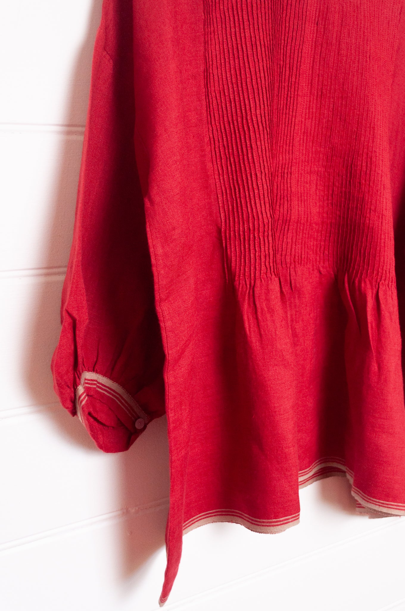 DVE Anisha pintuck top in crimson red linen.