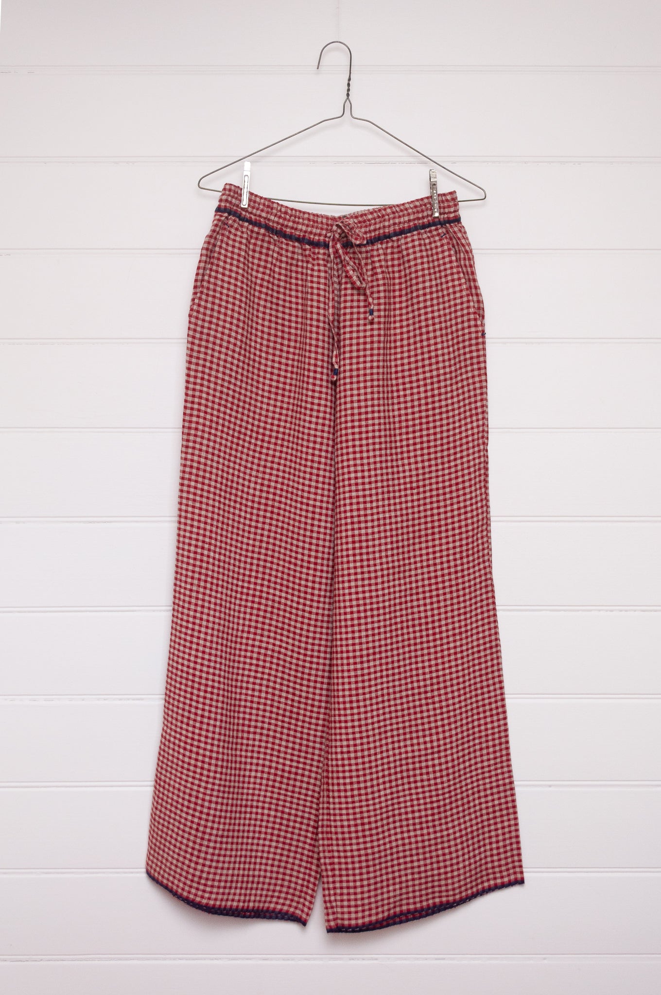 DVE Dityaa linen pants in crimson check.