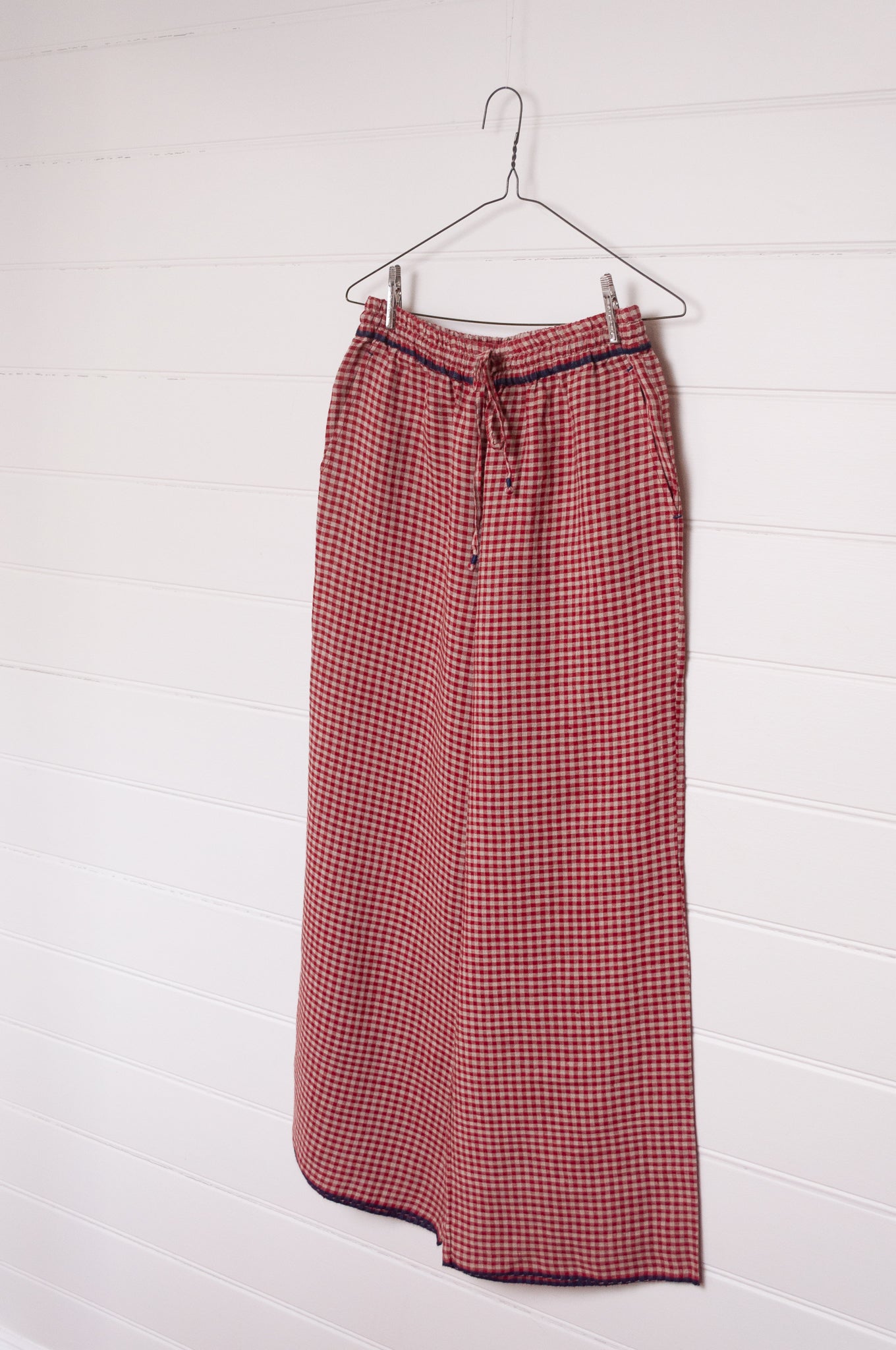 DVE Dityaa linen pants in crimson check.